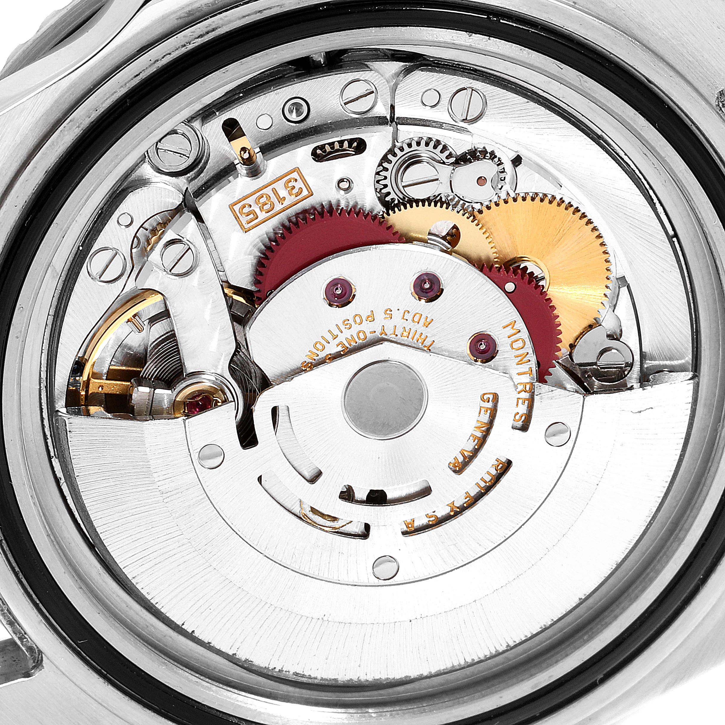 This close-up image of a Rolex GMT-Master 16710 Men's Stainless Steel Black Dial 16710 Men's Stainless Steel Black Dial model shows the intricate internal components of the watch movement.