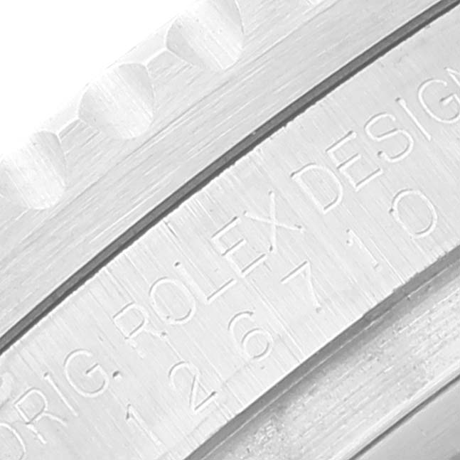 This close-up image shows the engraved design model number "16710" on the inner case of a Rolex GMT-Master 126710 Men
s Stainless Steel Black Dial 126710 Men
s Stainless Steel Black Dial watch.