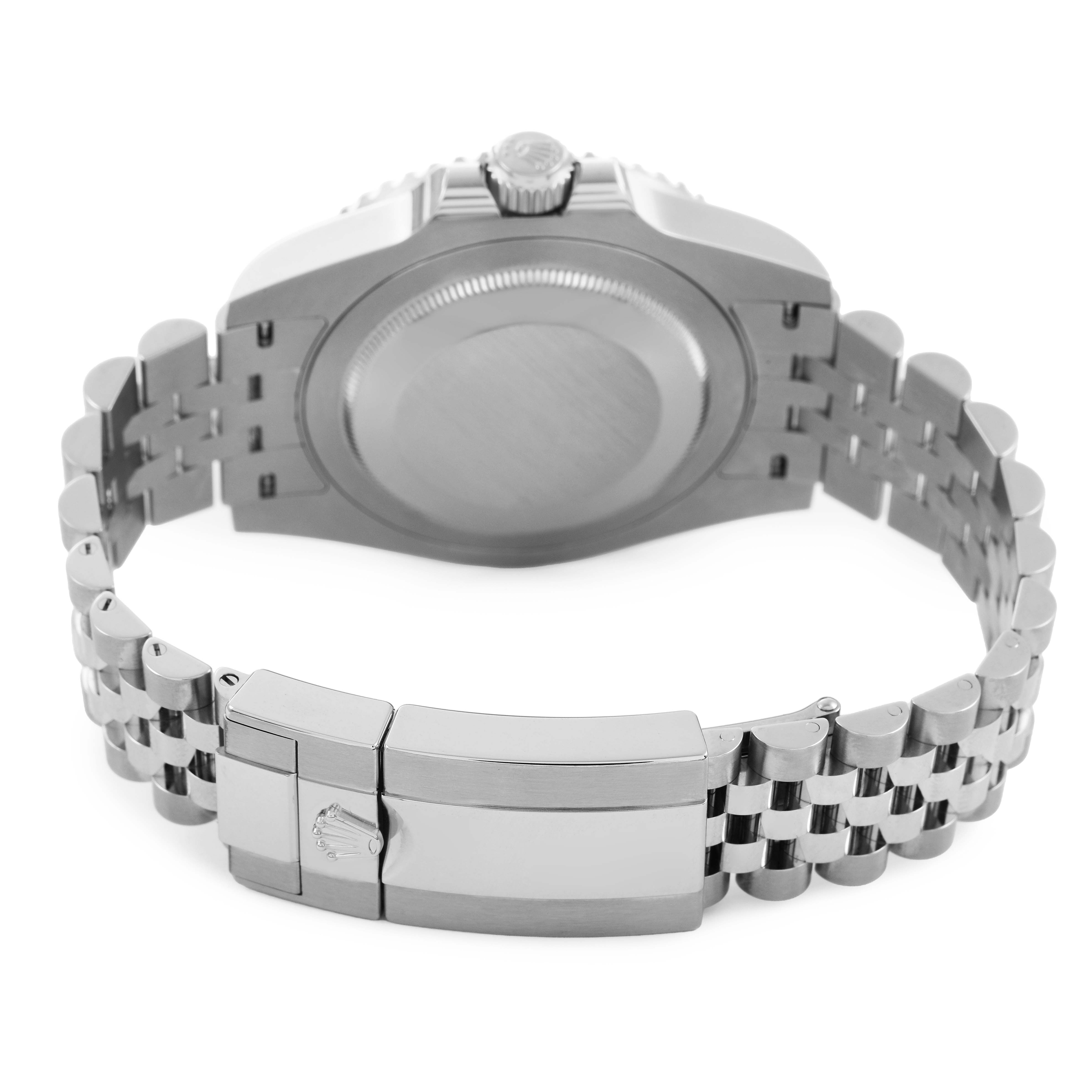 The image shows the back of the Rolex GMT-Master 126710 Men's Stainless Steel Black Dial watch, focusing on the bracelet and clasp.