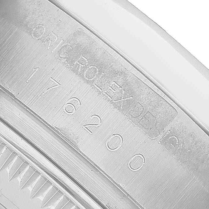 The image shows an engraved side view of a Rolex Oyster Perpetual 176200 Women's Stainless Steel Silver Dial, highlighting the serial and model numbers.