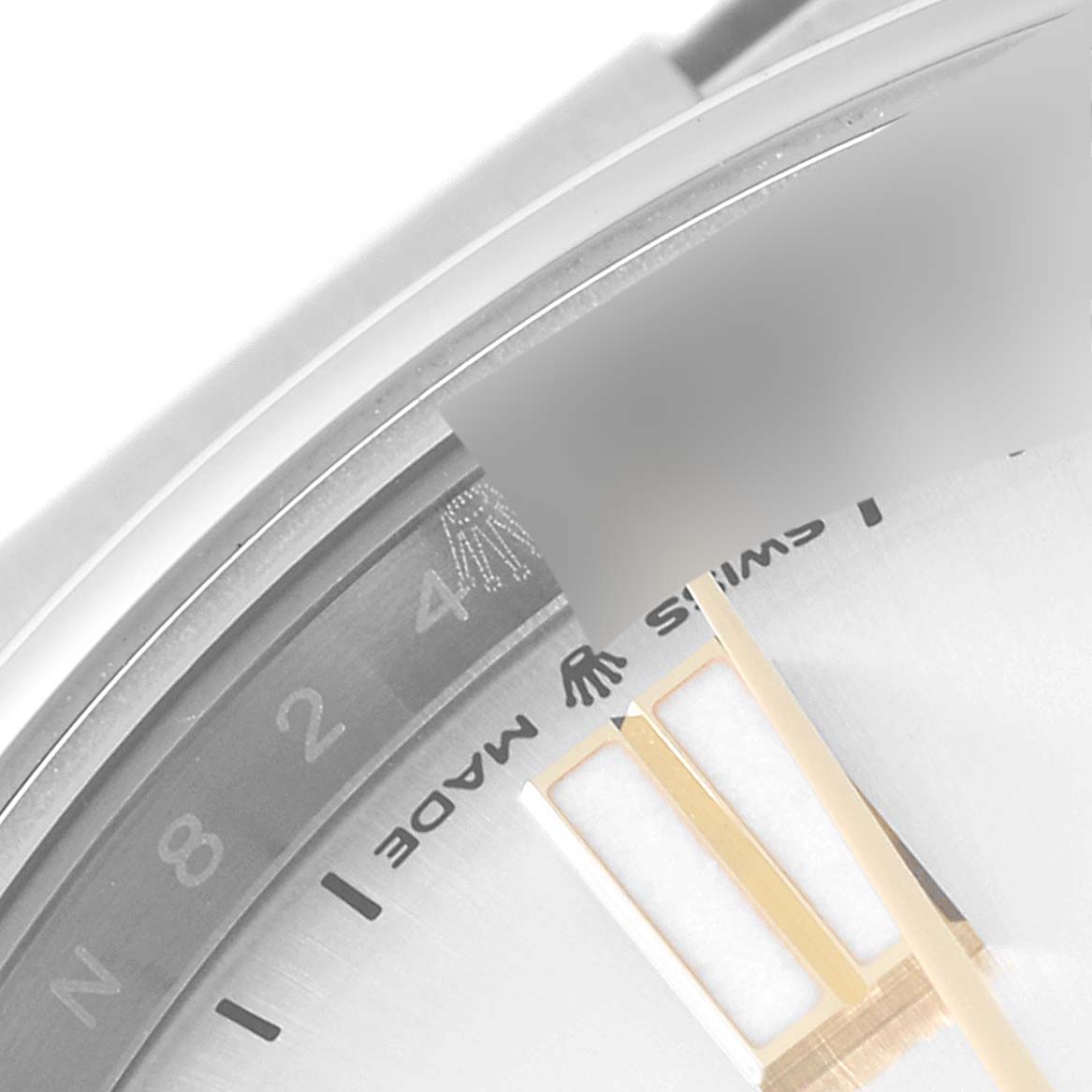 The image shows a close-up of the dial and part of the bezel of a Rolex Oyster Perpetual 124300 Men's Stainless Steel Silver Dial 124300 Men's Stainless Steel Silver Dial watch.