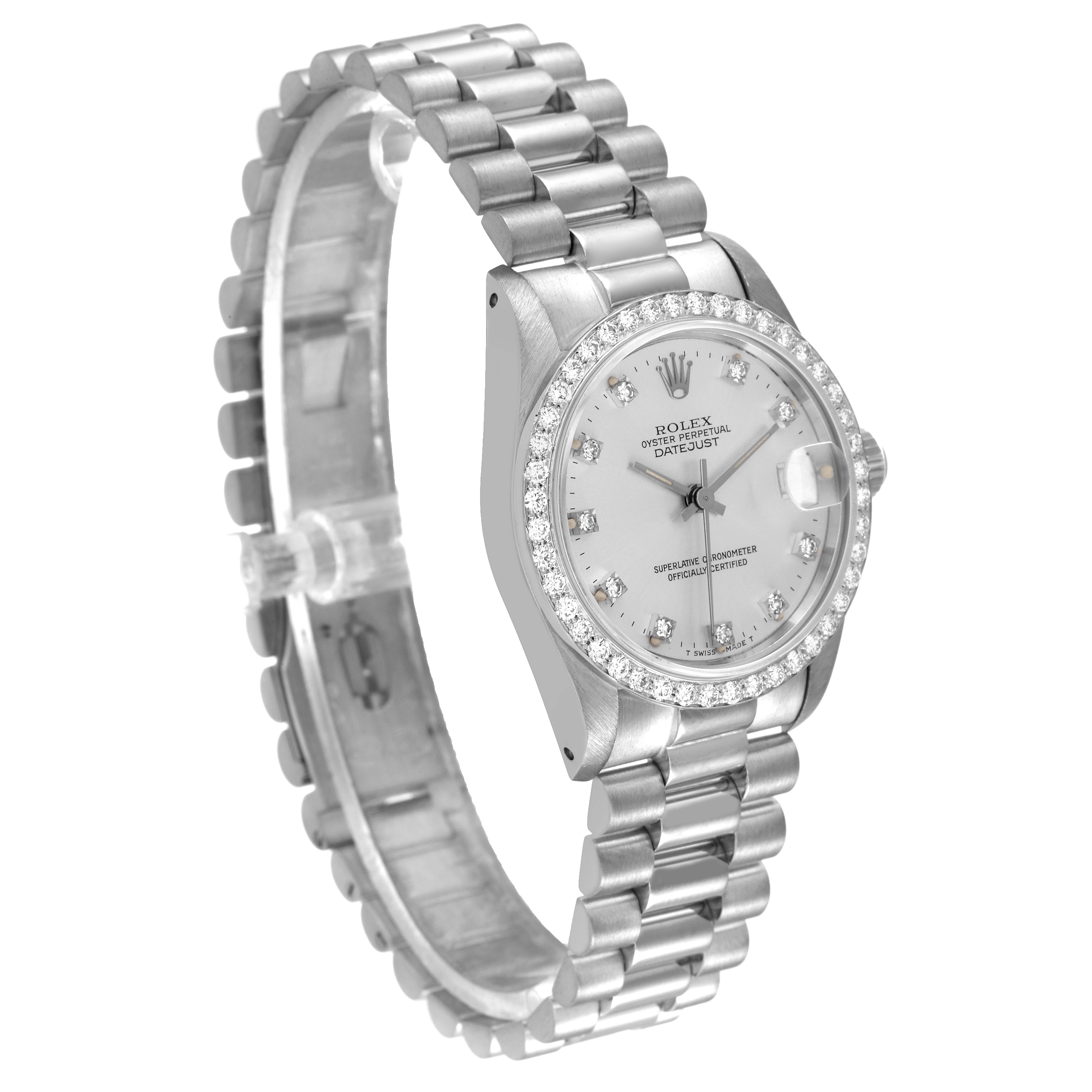 The image shows a side angle of the Rolex President 68289 Women
s White Gold Silver Dial 68289 Women
s White Gold Silver Dial model watch, highlighting the bracelet, watch face, and bezel with diamonds.