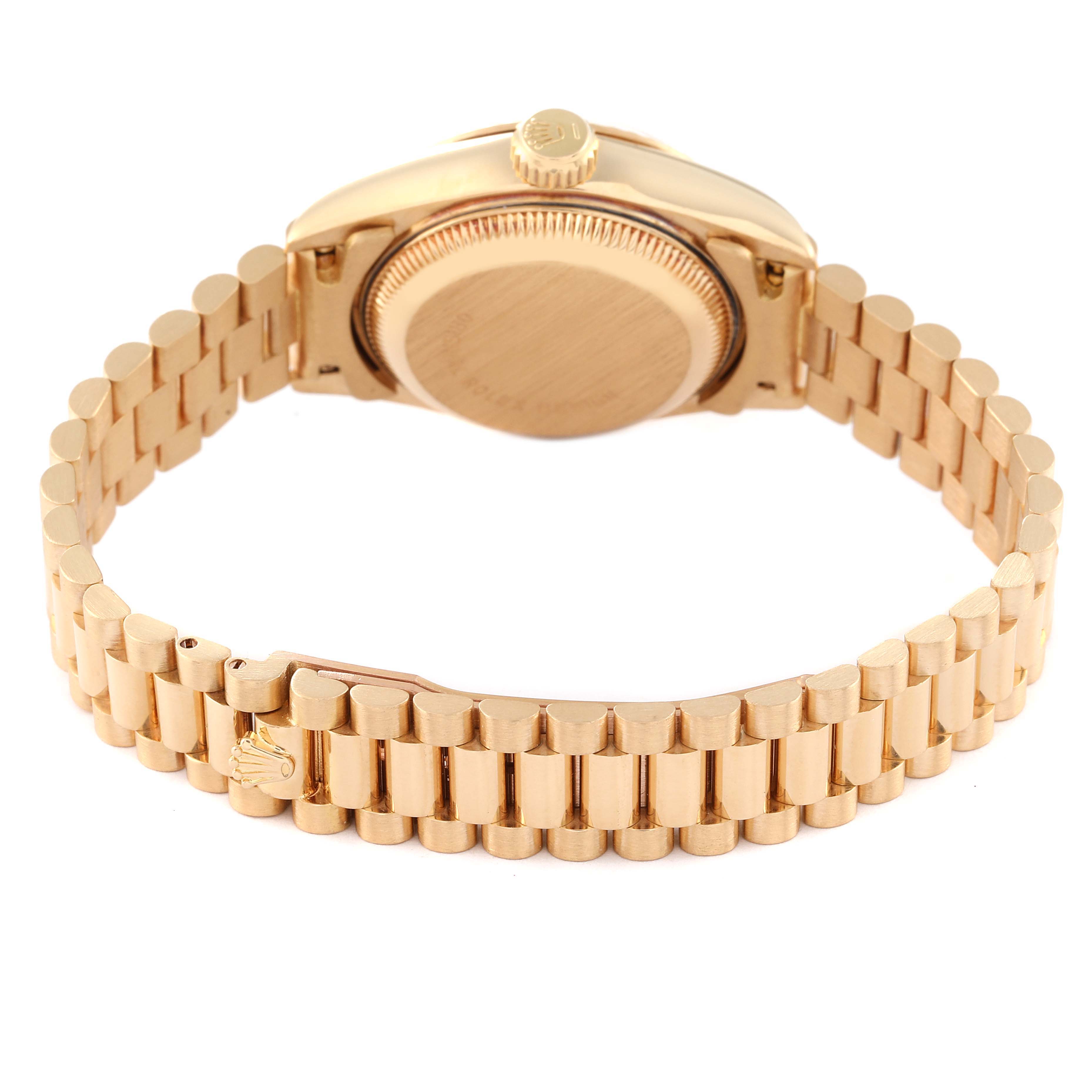 The image shows the back view of the Rolex President 69178 Women
s Yellow Gold Champagne Dial 69178 Women
s Yellow Gold Champagne Dial model watch, highlighting its gold bracelet and case back.