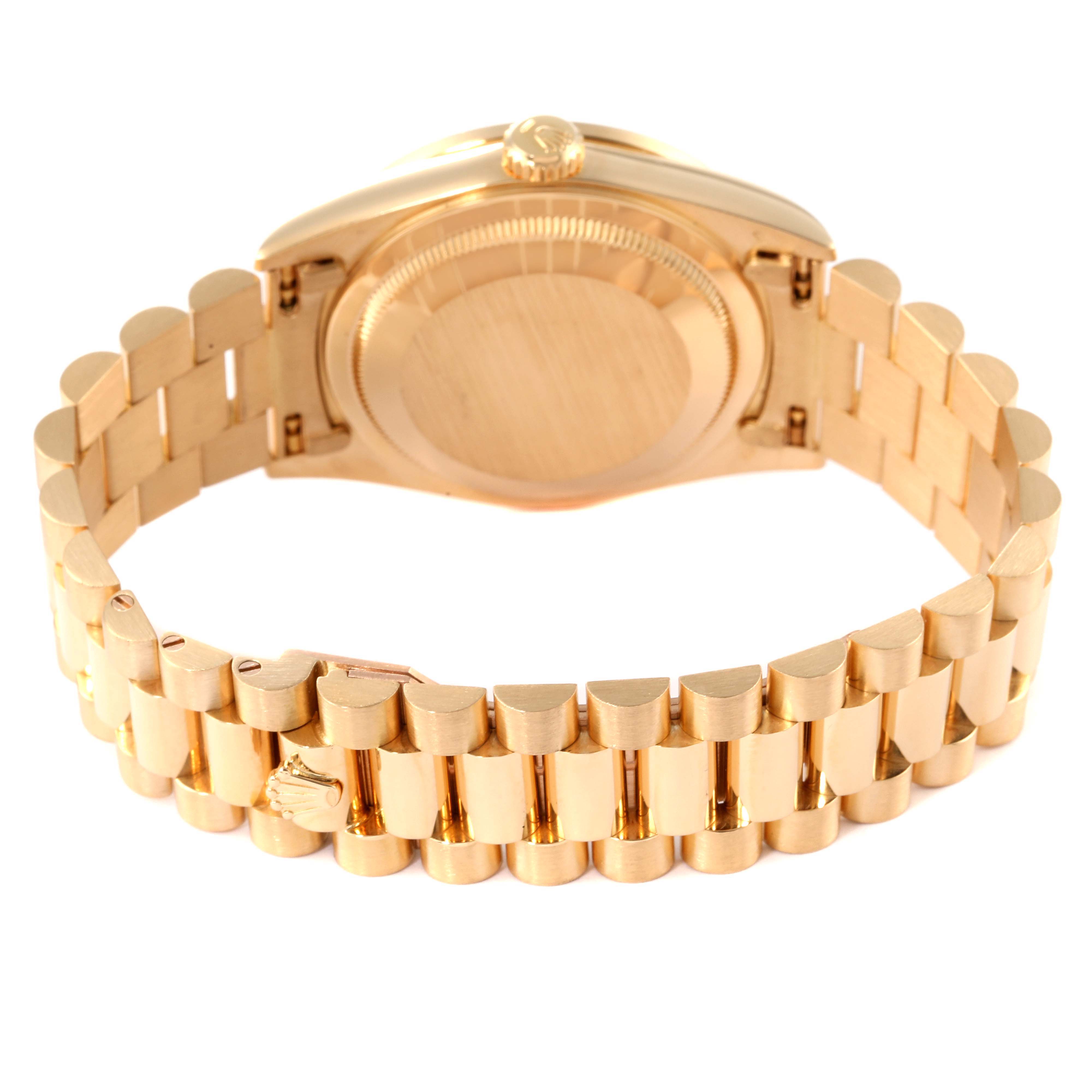 The image shows the back and bracelet of a Rolex President 18348 Men
s Yellow Gold Champagne Dial 18348 Men
s Yellow Gold Champagne Dial model watch, viewed from the rear.