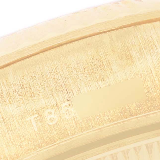 This image shows a close-up of the engraved inside case back of a Rolex President 69178 Women
s Yellow Gold Champagne Dial 69178 Women
s Yellow Gold Champagne Dial model watch.