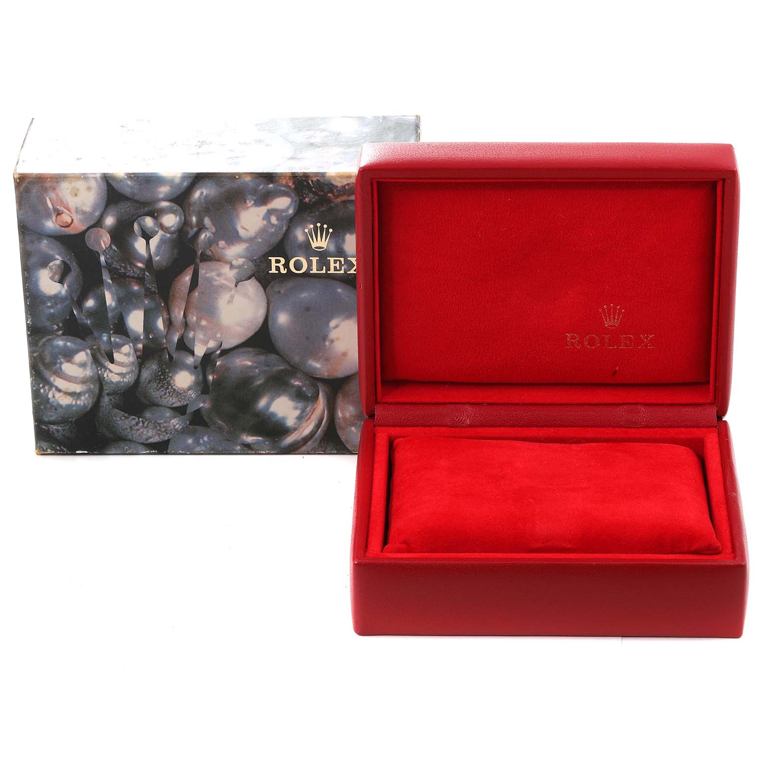 The image shows the open, empty red Rolex watch box and an elegant outer box featuring a pearl-like design.