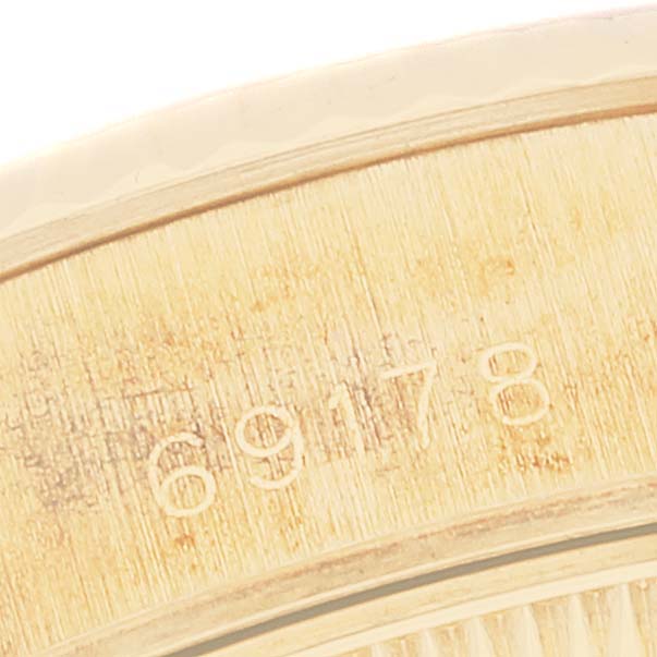 This image shows a close-up of the case back of a Rolex President 69178 Women
s Yellow Gold Champagne Dial 69178 Women
s Yellow Gold Champagne Dial model, showcasing the engraved model number.