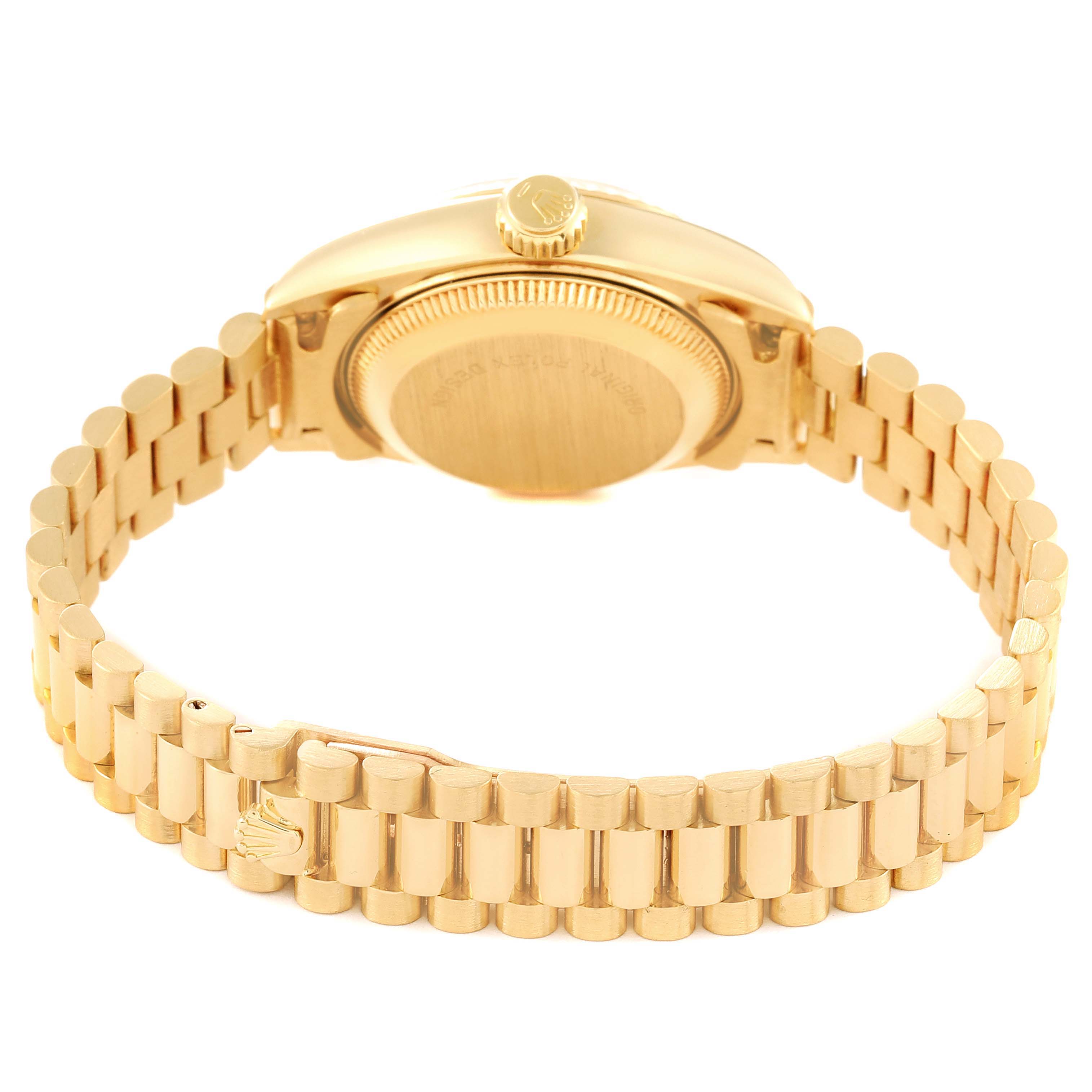 The image shows the back view of a Rolex President 69178 Women
s Yellow Gold Champagne Dial 69178 Women
s Yellow Gold Champagne Dial watch, highlighting the case back and the gold bracelet with clasp.