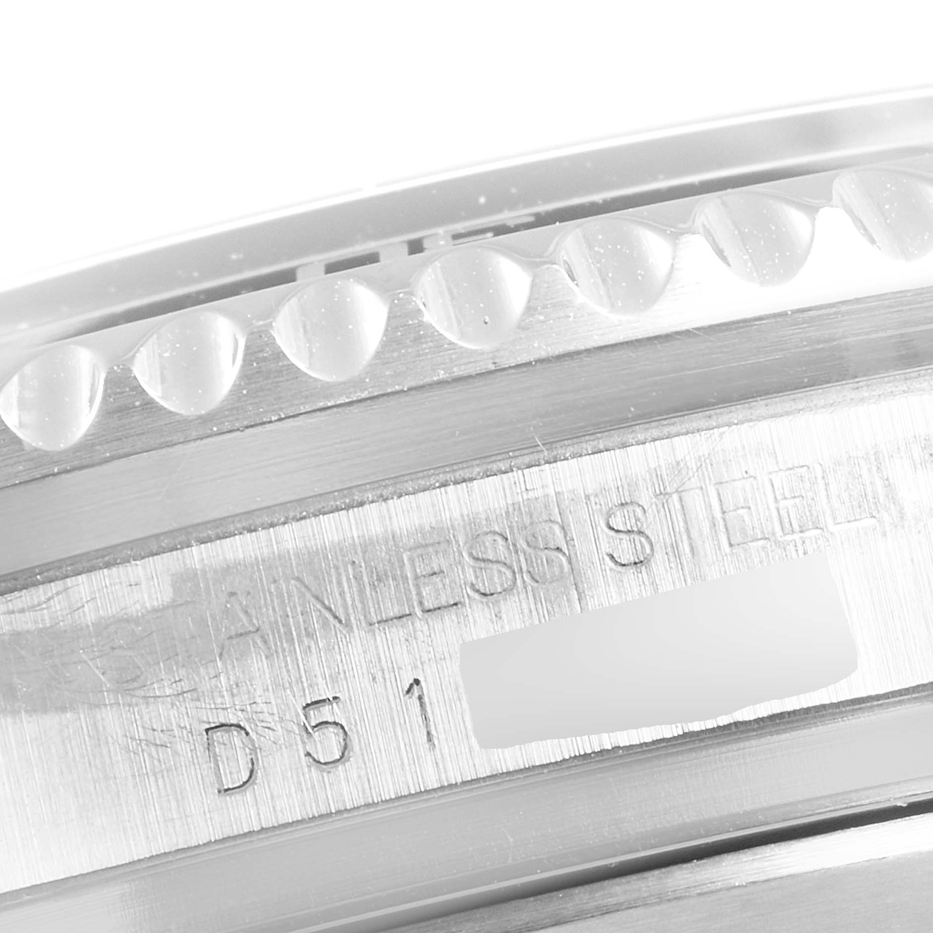This close-up image shows the edge of the bezel and the engraved case side of a Rolex Sea-Dweller 16600 Men
s Stainless Steel Black Dial 16600 Men
s Stainless Steel Black Dial watch.