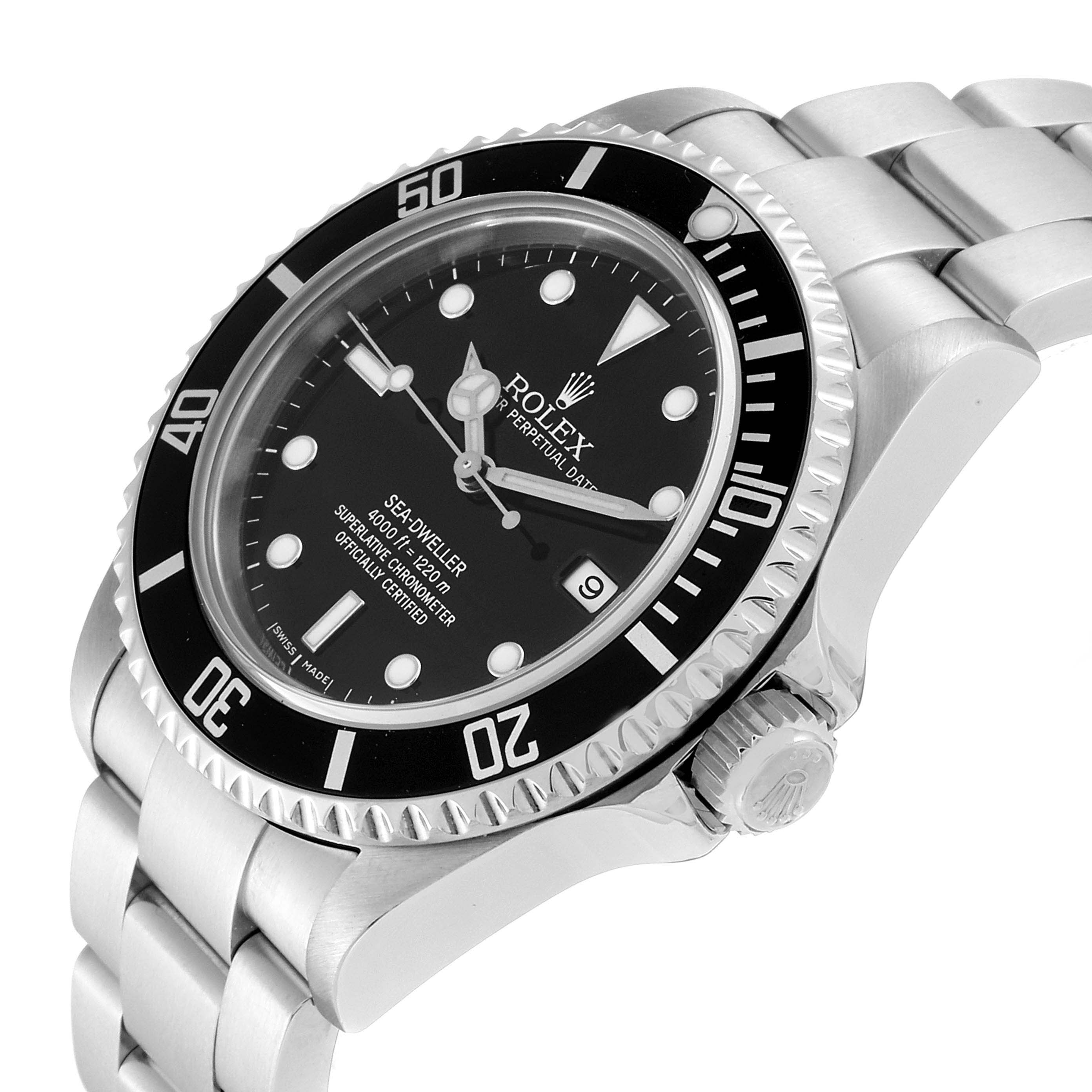 The image shows a Rolex Sea-Dweller 16600 Men
s Stainless Steel Black Dial 16600 Men
s Stainless Steel Black Dial watch angled to display its face, bezel, crown, and part of the bracelet.