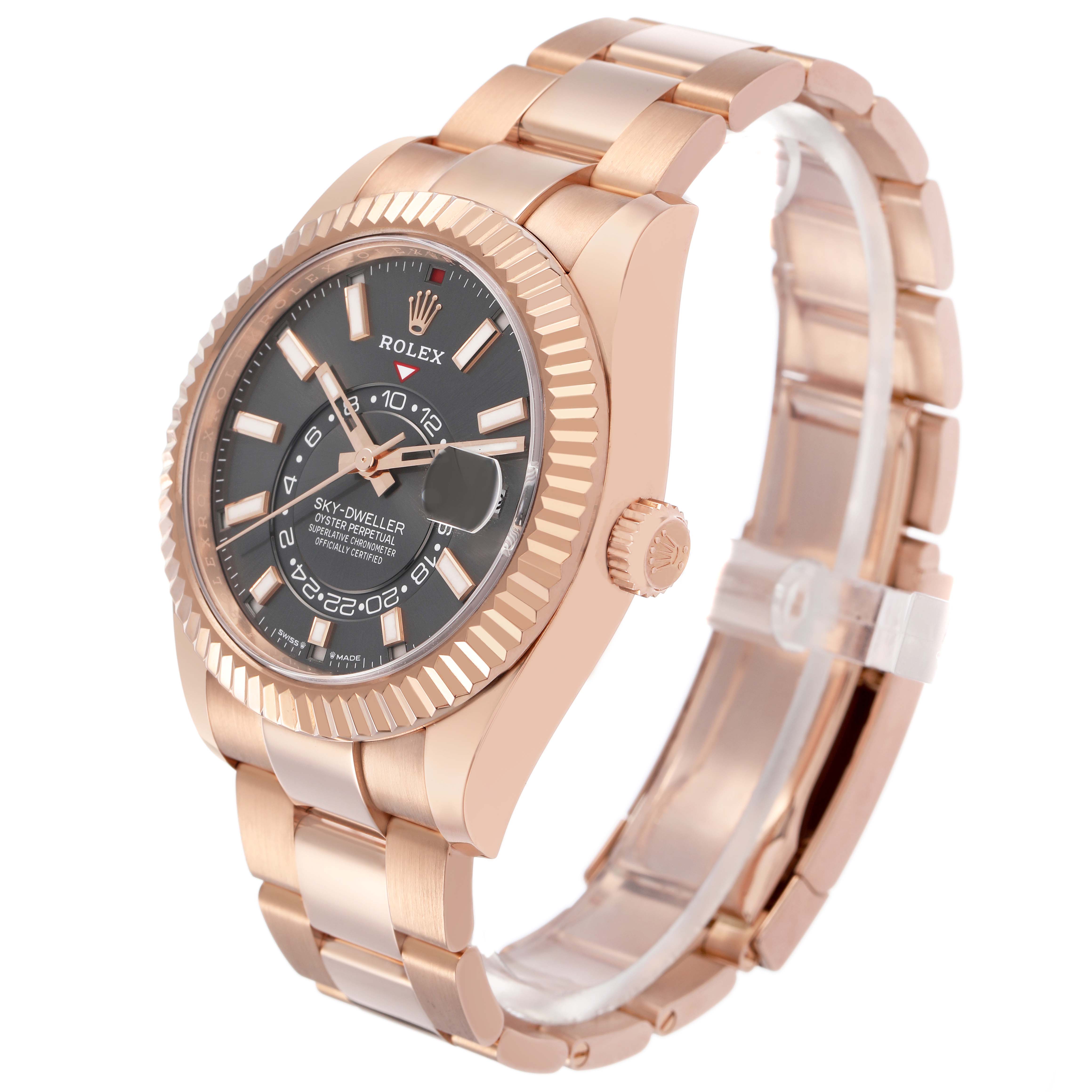 The Rolex Sky-Dweller 326935 Men's Rose Gold Grey Dial watch is displayed in a three-quarter view, highlighting its rose gold casing, fluted bezel, and bracelet.