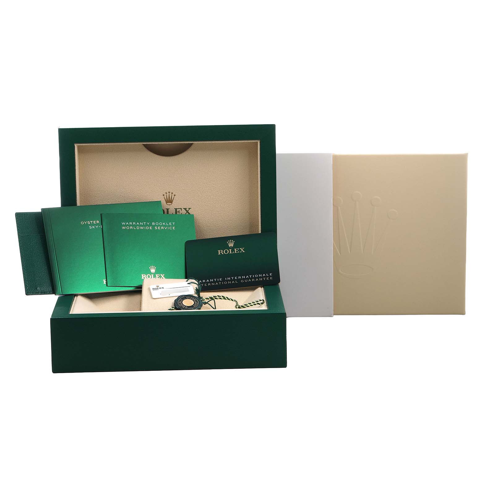 The image shows Rolex Sky-Dweller 326935 Men's Rose Gold Grey Dial packaging with manuals, a warranty card, and a tag from a front angle.