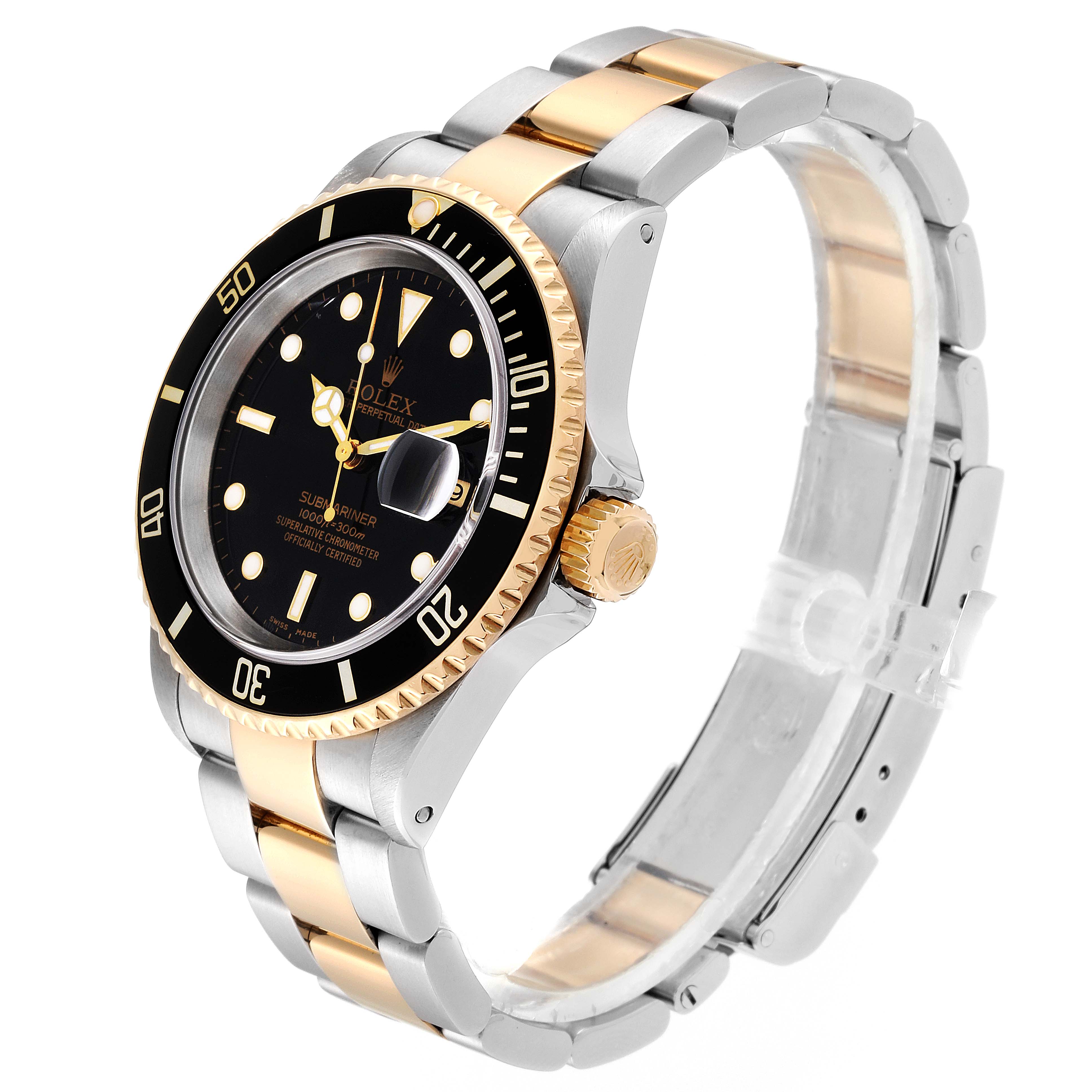 This image shows a Rolex Submariner 16613 Men
s Steel and Gold (two tone) Black Dial 16613 Men
s Steel and Gold (two tone) Black Dial watch at a three-quarter angle, highlighting the bezel, dial, and two-tone bracelet.