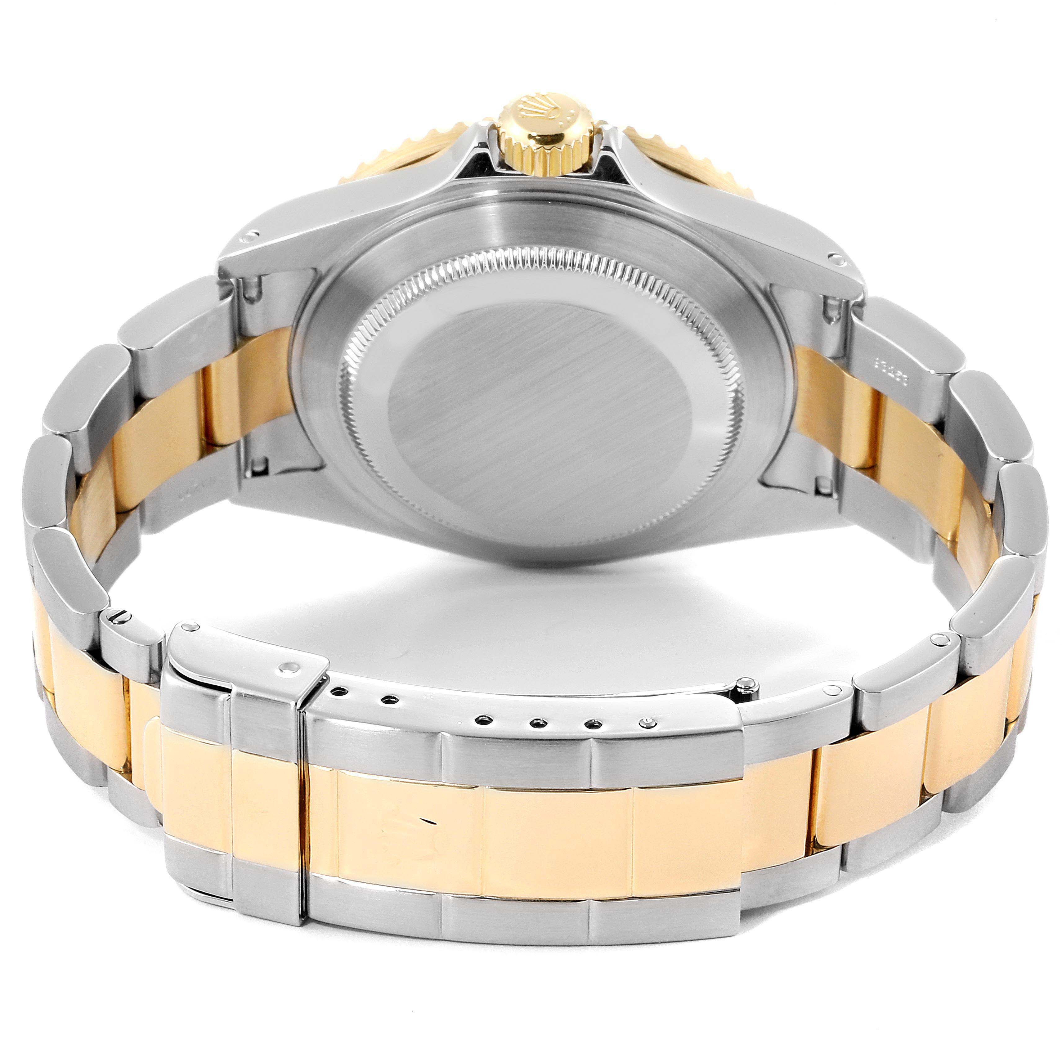 This image shows the back and strap of a Rolex Submariner 16613 Men
s Steel and Gold (two tone) Black Dial 16613 Men
s Steel and Gold (two tone) Black Dial watch from a rear angle.