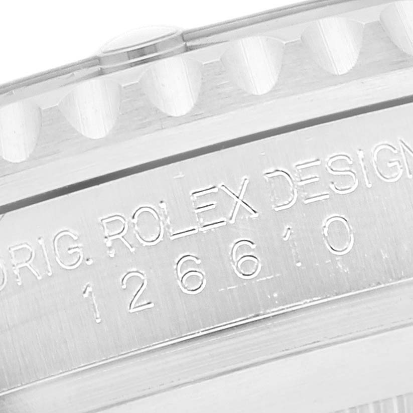 This image shows a close-up of the serial number and part of the bezel on a Rolex Submariner 126610 Men
s Stainless Steel Black Dial 126610 Men
s Stainless Steel Black Dial watch.