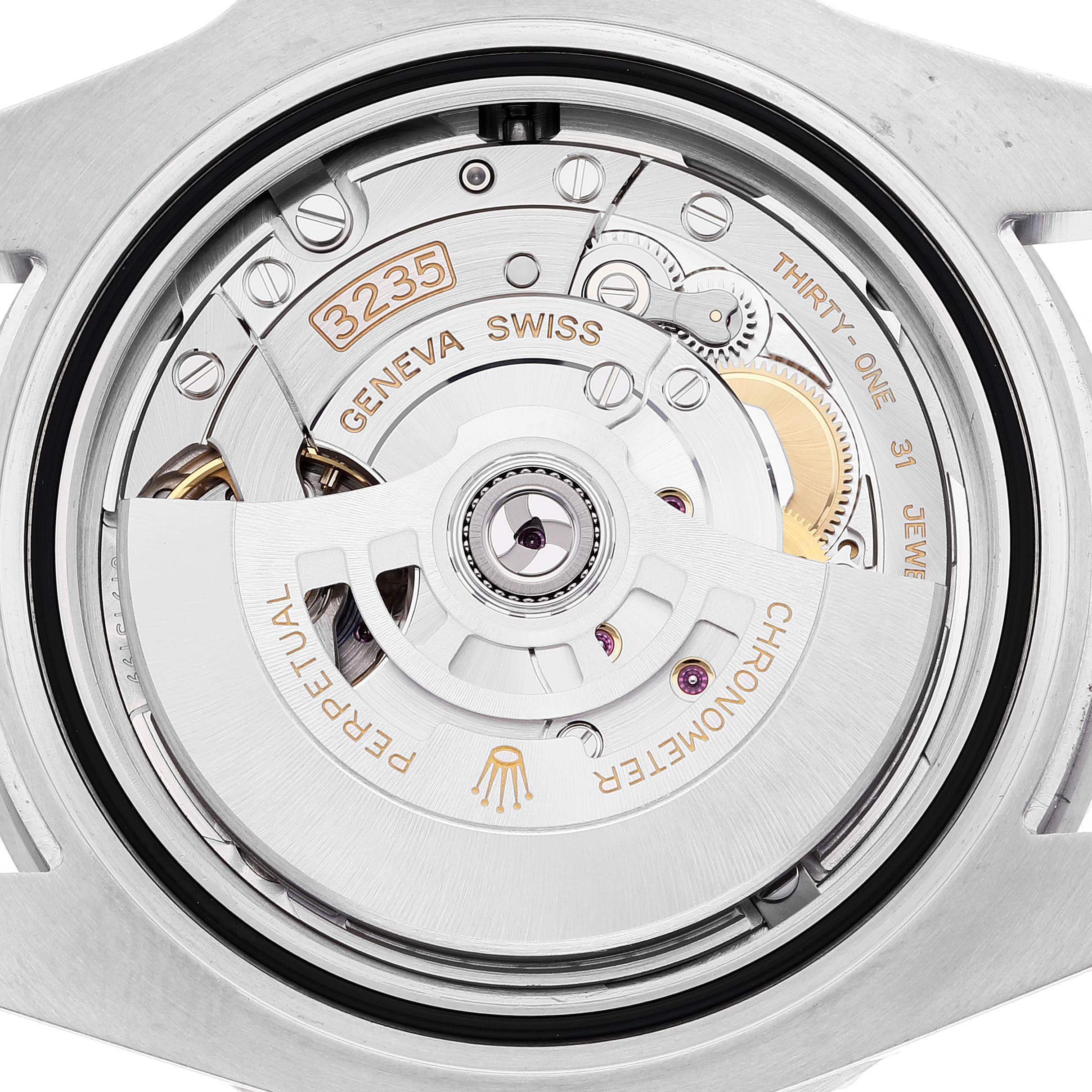 This image shows the movement and mechanism from the back of a Rolex Submariner 126610 Men
s Stainless Steel Black Dial 126610 Men
s Stainless Steel Black Dial watch, featuring the 3235 caliber.