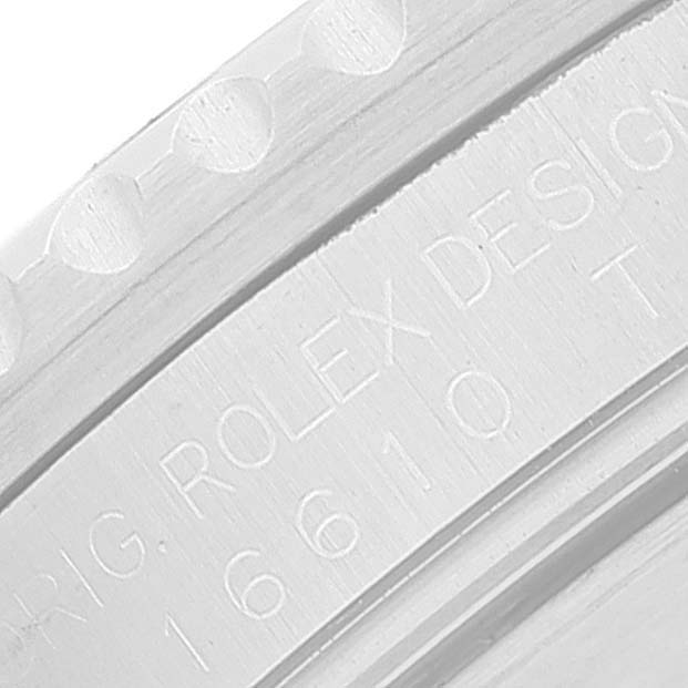 This image shows a close-up of the engraved side of the Rolex Submariner 16610 Men
s Stainless Steel Black Dial 16610 Men
s Stainless Steel Black Dial watch model.