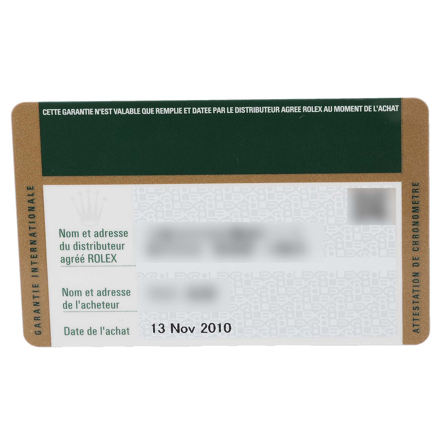 This image shows the warranty card for a Rolex Submariner 16610 Men
s Stainless Steel Black Dial 16610 Men
s Stainless Steel Black Dial watch, captured from a top-down angle.