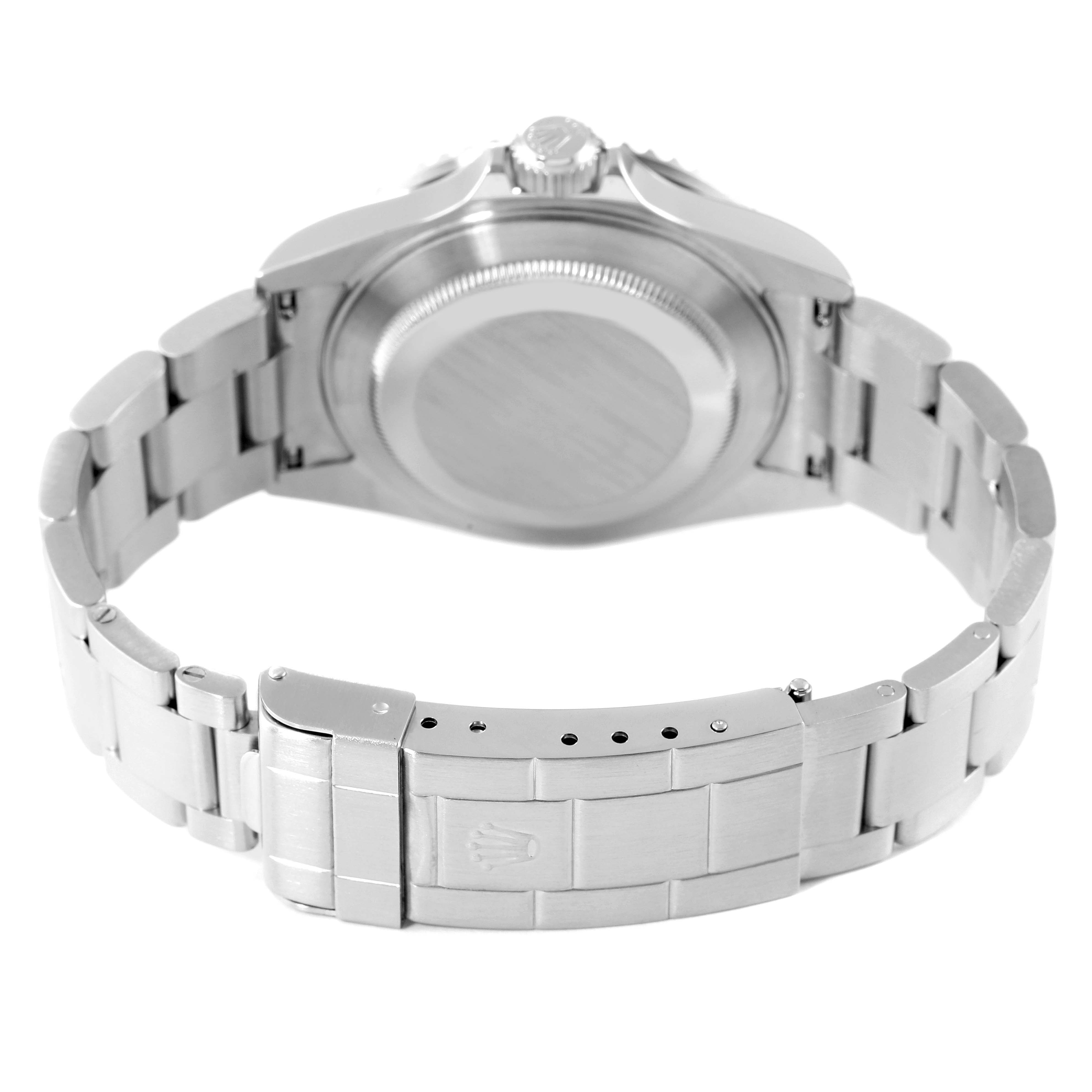 The image shows the back of a Rolex Submariner 16610 Men
s Stainless Steel Black Dial 16610 Men
s Stainless Steel Black Dial watch, focusing on the case back, crown, and bracelet clasp.