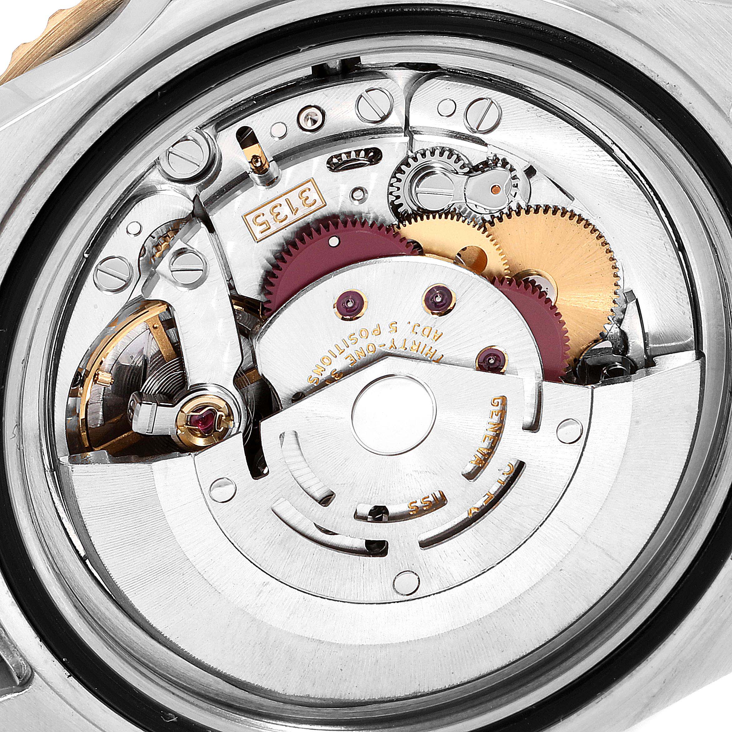 The image shows the internal movement mechanism of a Rolex Submariner 16613 Men
s Steel and Gold (two tone) Blue Dial 16613 Men
s Steel and Gold (two tone) Blue Dial watch, viewed from the back.