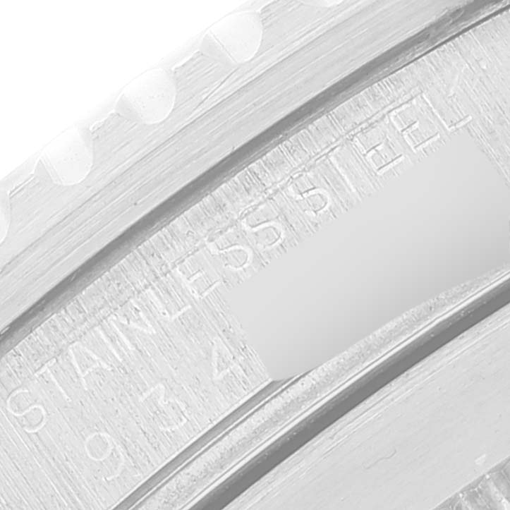 The image shows a close-up of the bezel and engraved markings on the Rolex Submariner 16800 Men
s Stainless Steel Black Dial 16800 Men
s Stainless Steel Black Dial watch.