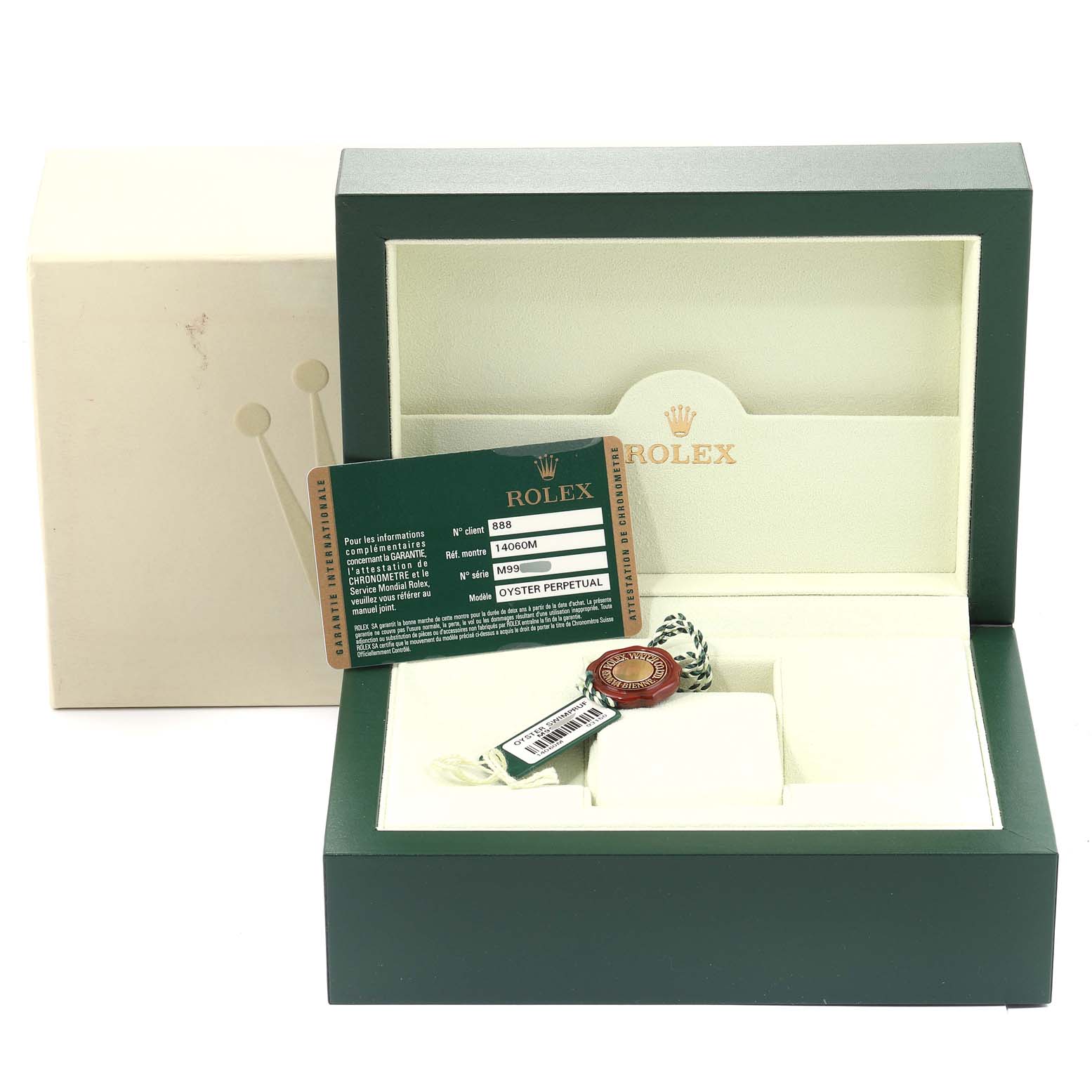 The image shows a green Rolex Submariner 14060M Men
s Stainless Steel Black Dial 14060M Men
s Stainless Steel Black Dial watch box, with a warranty card, tag, and white cushion inside it, viewed from the front.