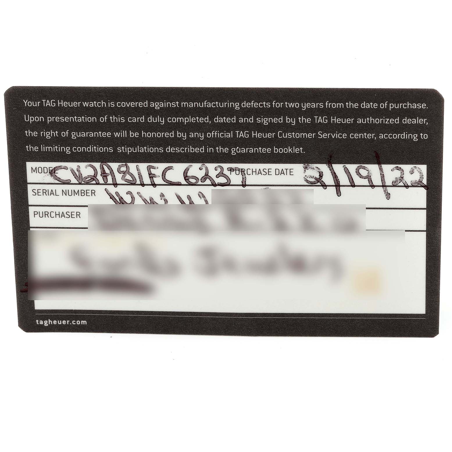 This is a TAG Heuer warranty card for the Carrera model, showing the model number, serial number, purchase date, and purchaser information.
