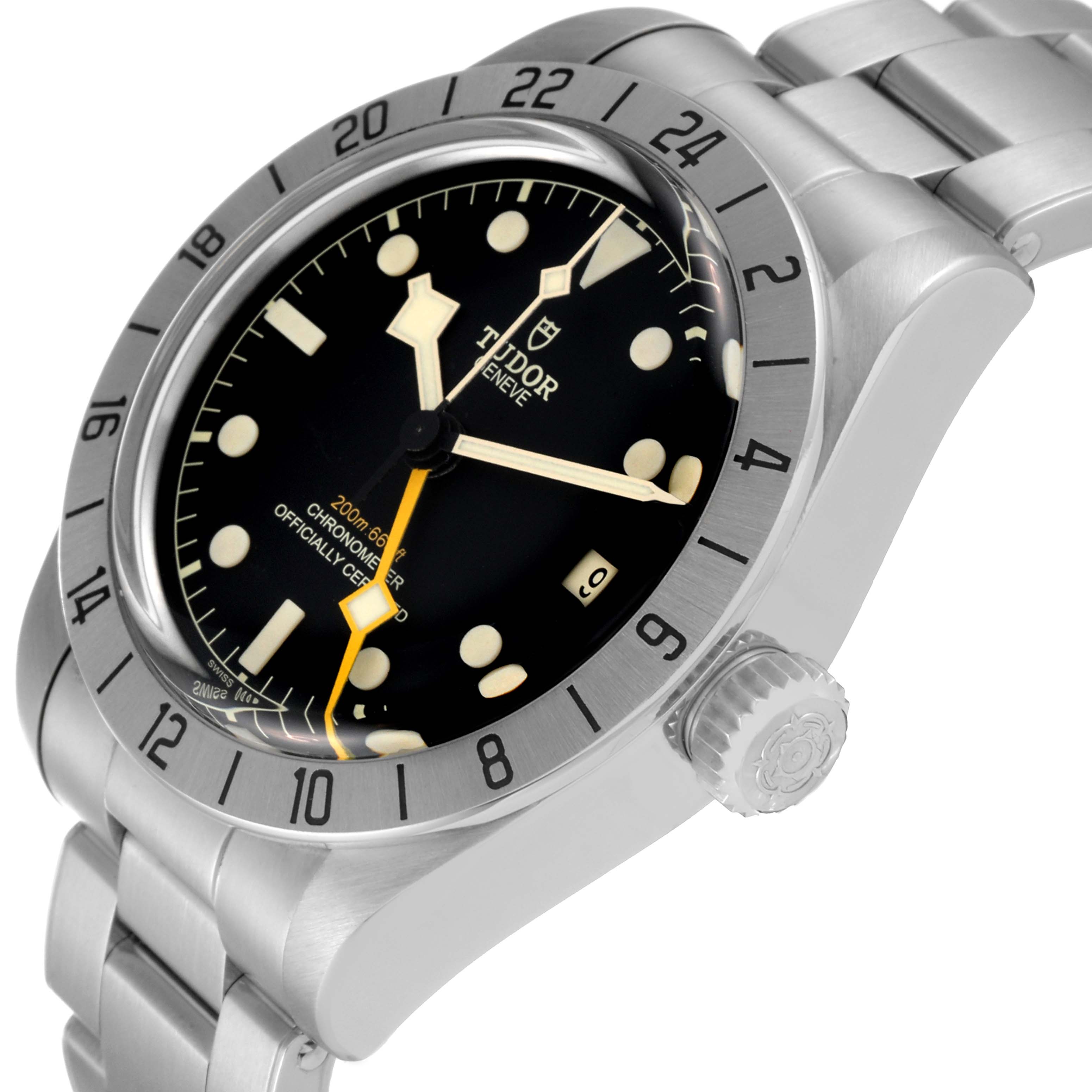 This is a close-up angled view of the Tudor Heritage Black Bay M79470-0003 Men's Stainless Steel Black Dial M79470-0003 Men's Stainless Steel Black Dial watch, showing the dial, bezel, case, crown, and part of the bracelet.