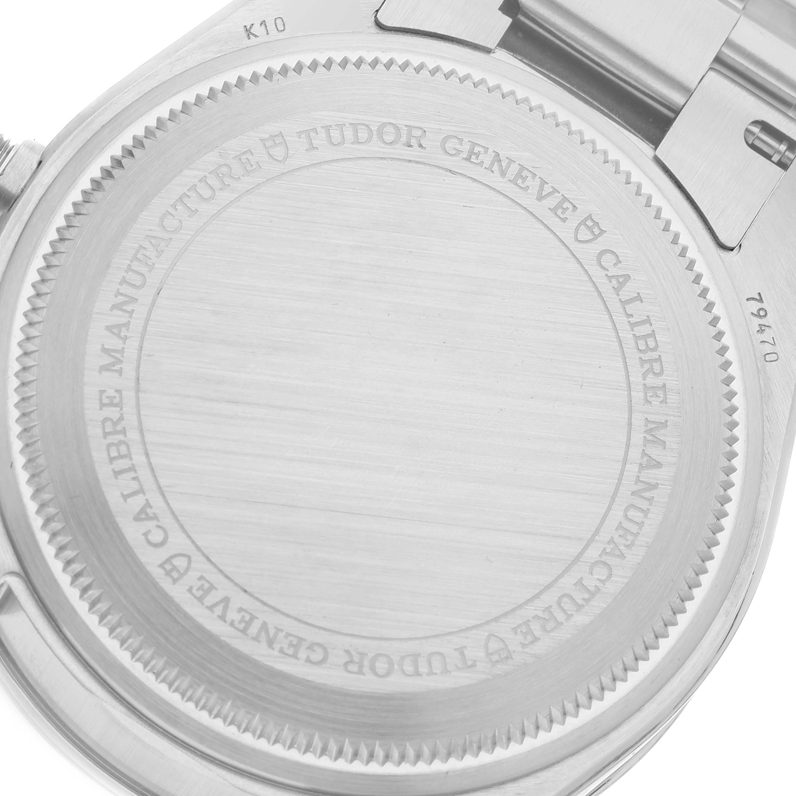 The image shows the back casing of the Tudor Heritage Black Bay M79470-0003 Men's Stainless Steel Black Dial M79470-0003 Men's Stainless Steel Black Dial watch, highlighting its engraved details and model number.