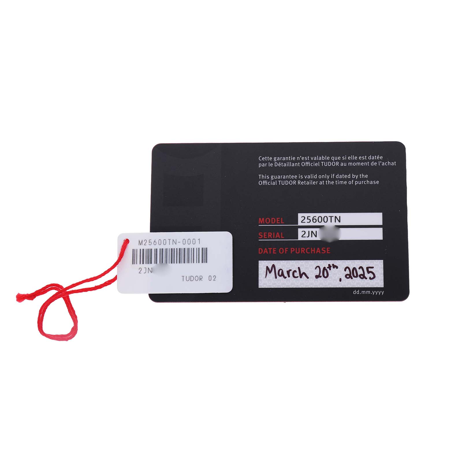 The image shows a warranty card for the Tudor Pelagos 25600TN Men's Titanium Black Dial, including model and serial numbers.