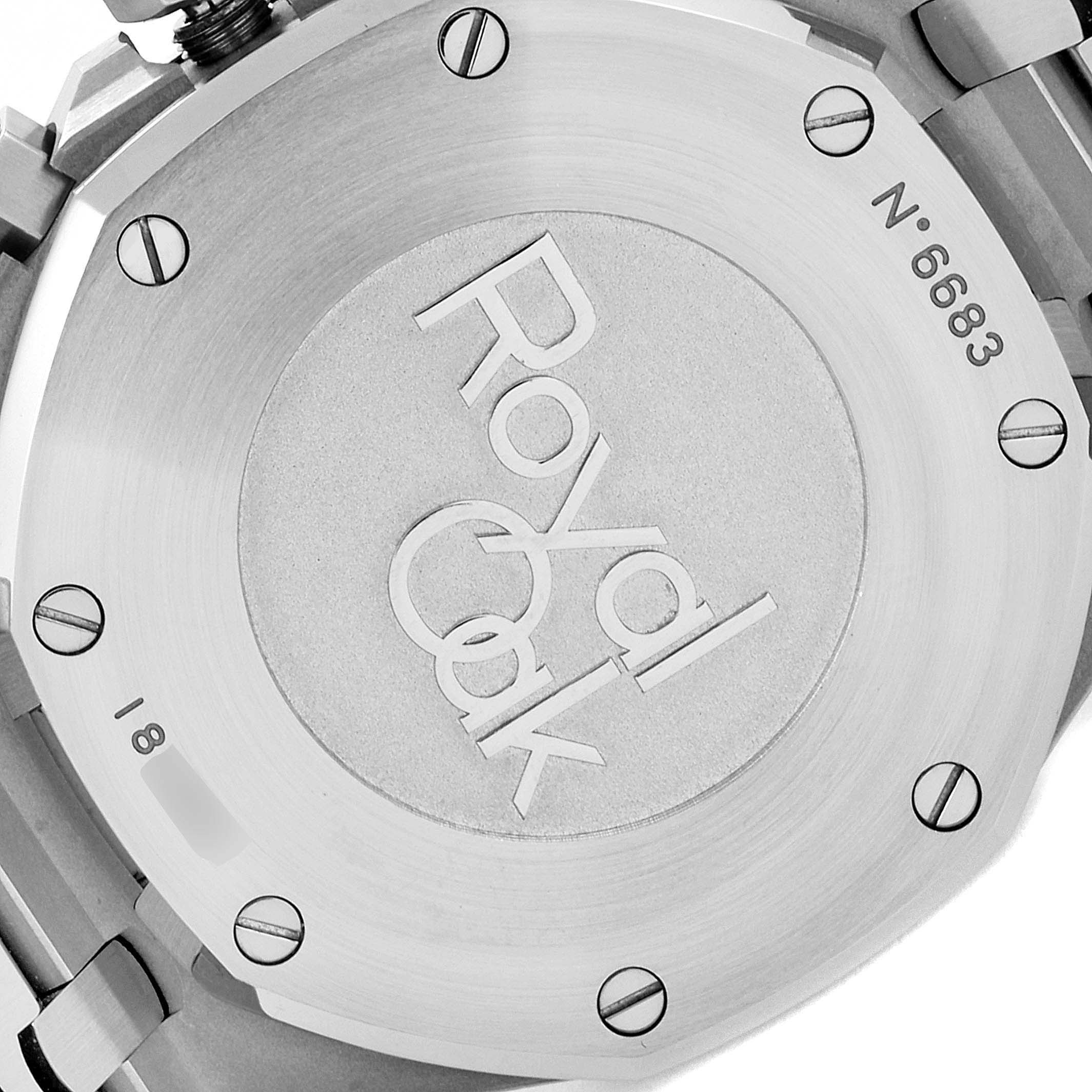 The image shows the case back of an Audemars Piguet Royal Oak 26320ST Men's Stainless Steel Silver Dial 26320ST Men's Stainless Steel Silver Dial watch, displaying its engraved model name and serial number.