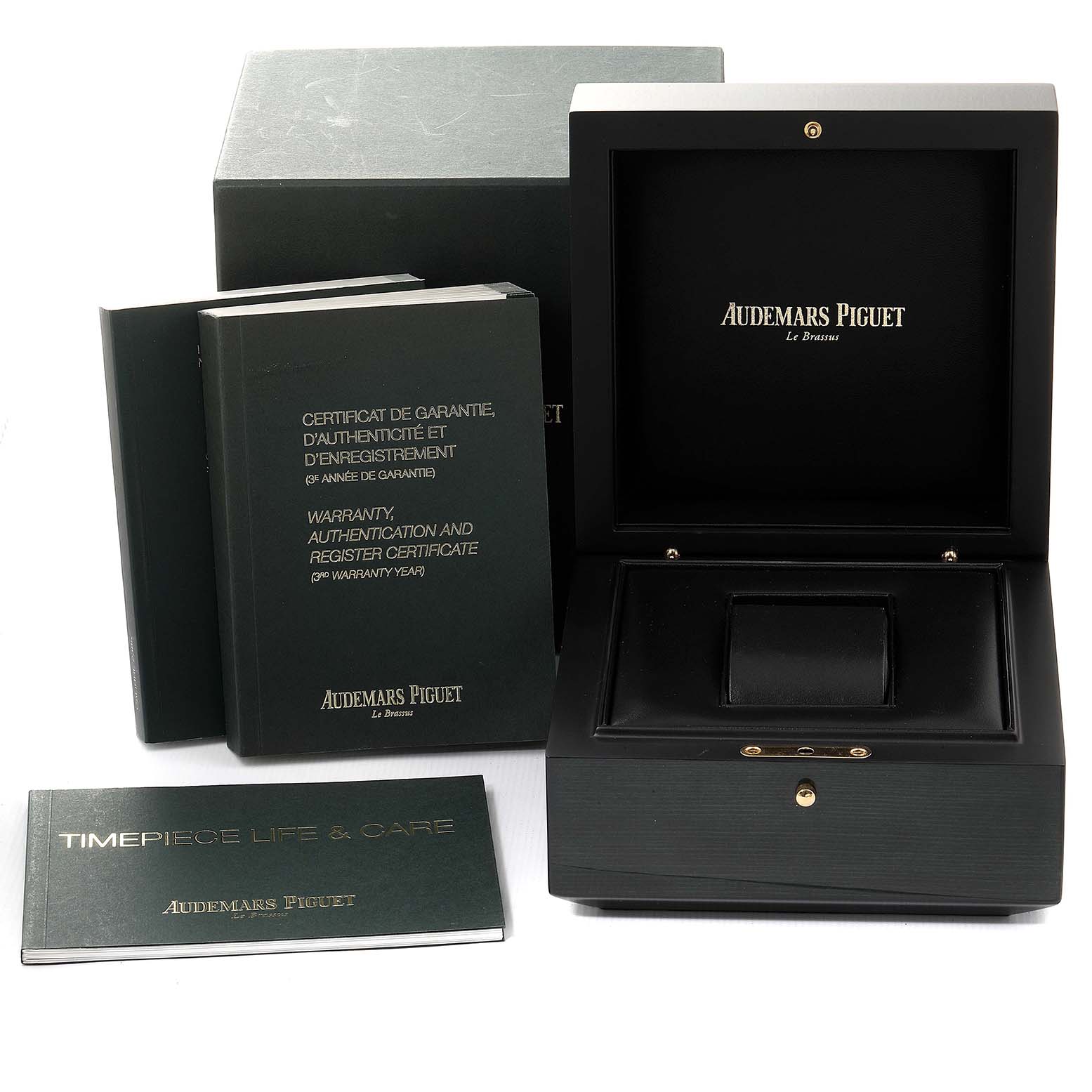 The image shows an Audemars Piguet Royal Oak 26320ST Men's Stainless Steel Silver Dial 26320ST Men's Stainless Steel Silver Dial watch box, warranty, authentication, and care booklets from a front angle.