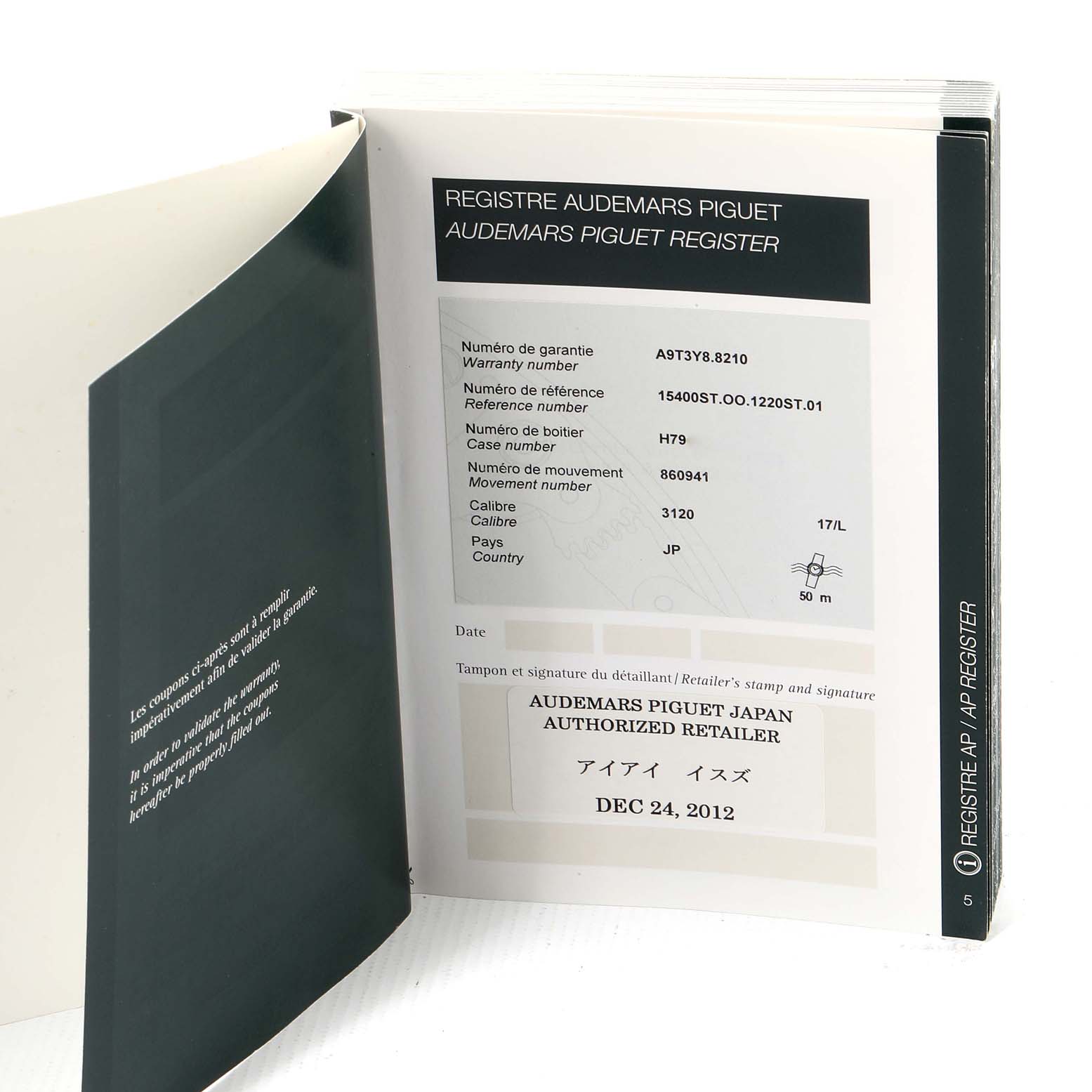 The image shows an open warranty booklet for the Royal Oak model by Audemars Piguet, including reference, case, and movement numbers.