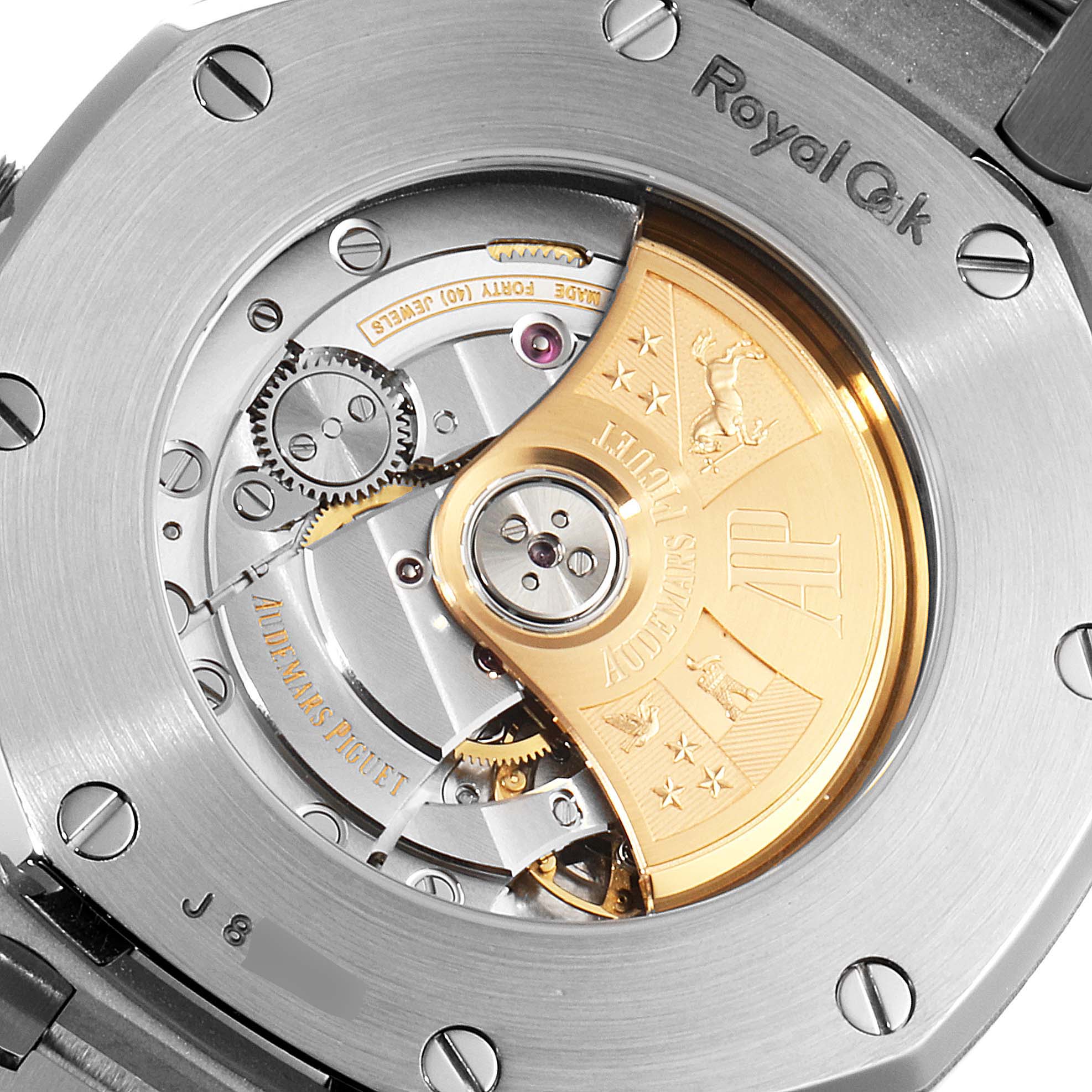 The image shows the back view of an Audemars Piguet Royal Oak 15400ST.OO.1220ST.02 Men's Stainless Steel White Dial 15400ST.OO.1220ST.02 Men's Stainless Steel White Dial watch, highlighting its intricate automatic movement.