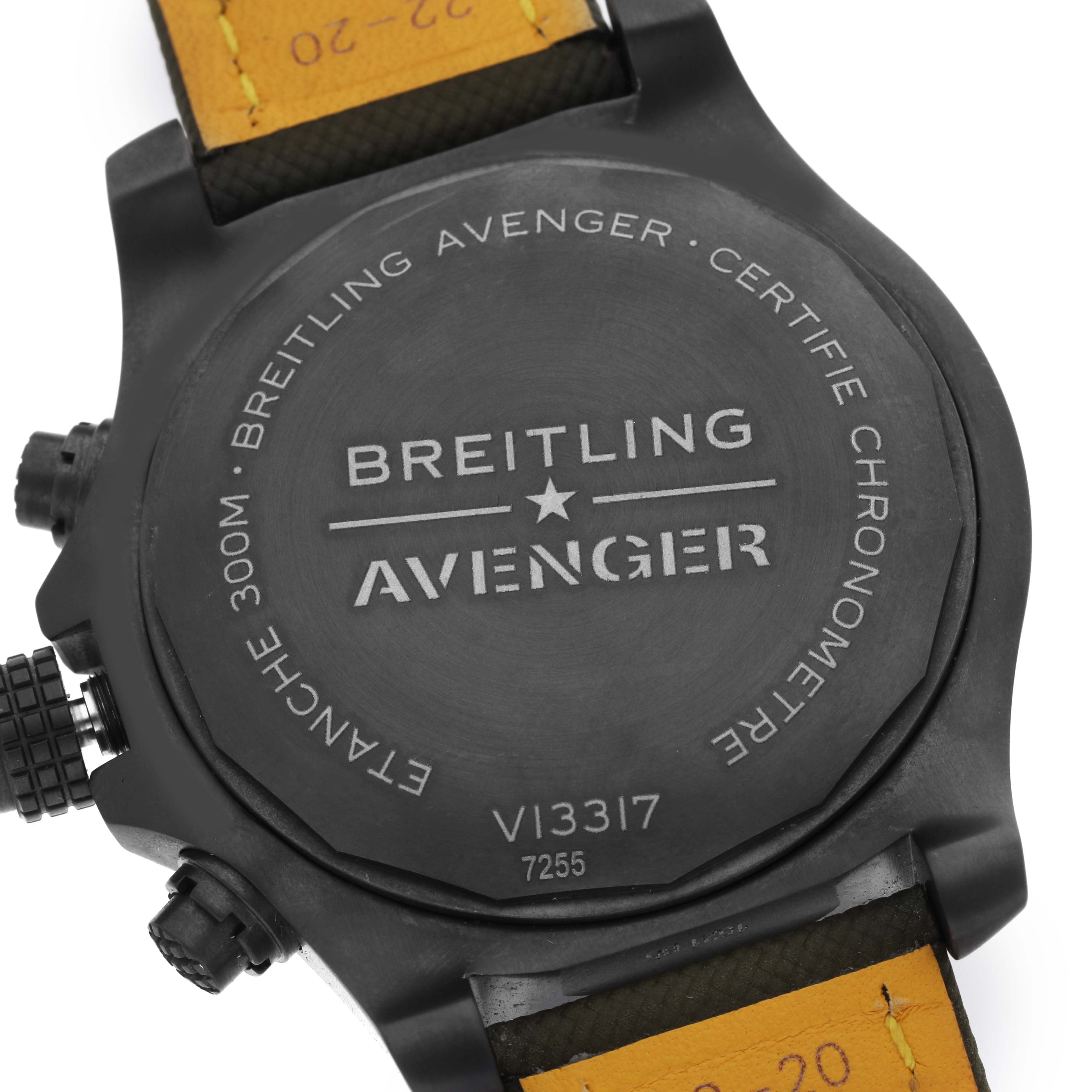 The image shows the case back of a Breitling Avenger V13317 Men
s Titanium Green Dial watch, highlighting the engraved details and strap connection.