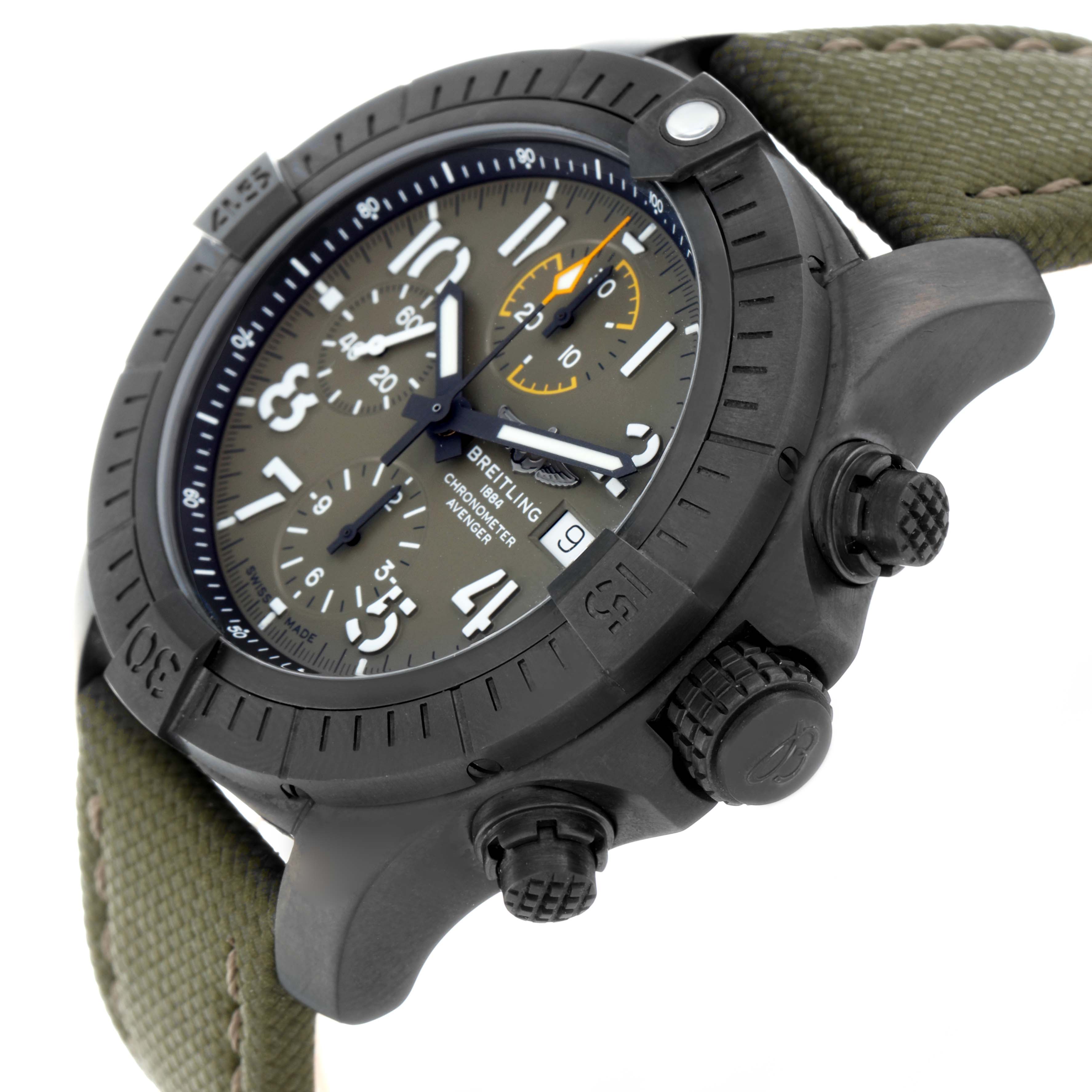 The Breitling Avenger V13317 Men
s Titanium Green Dial watch is shown from a side angle, highlighting the dial, bezel, crown, pushers, and green strap.