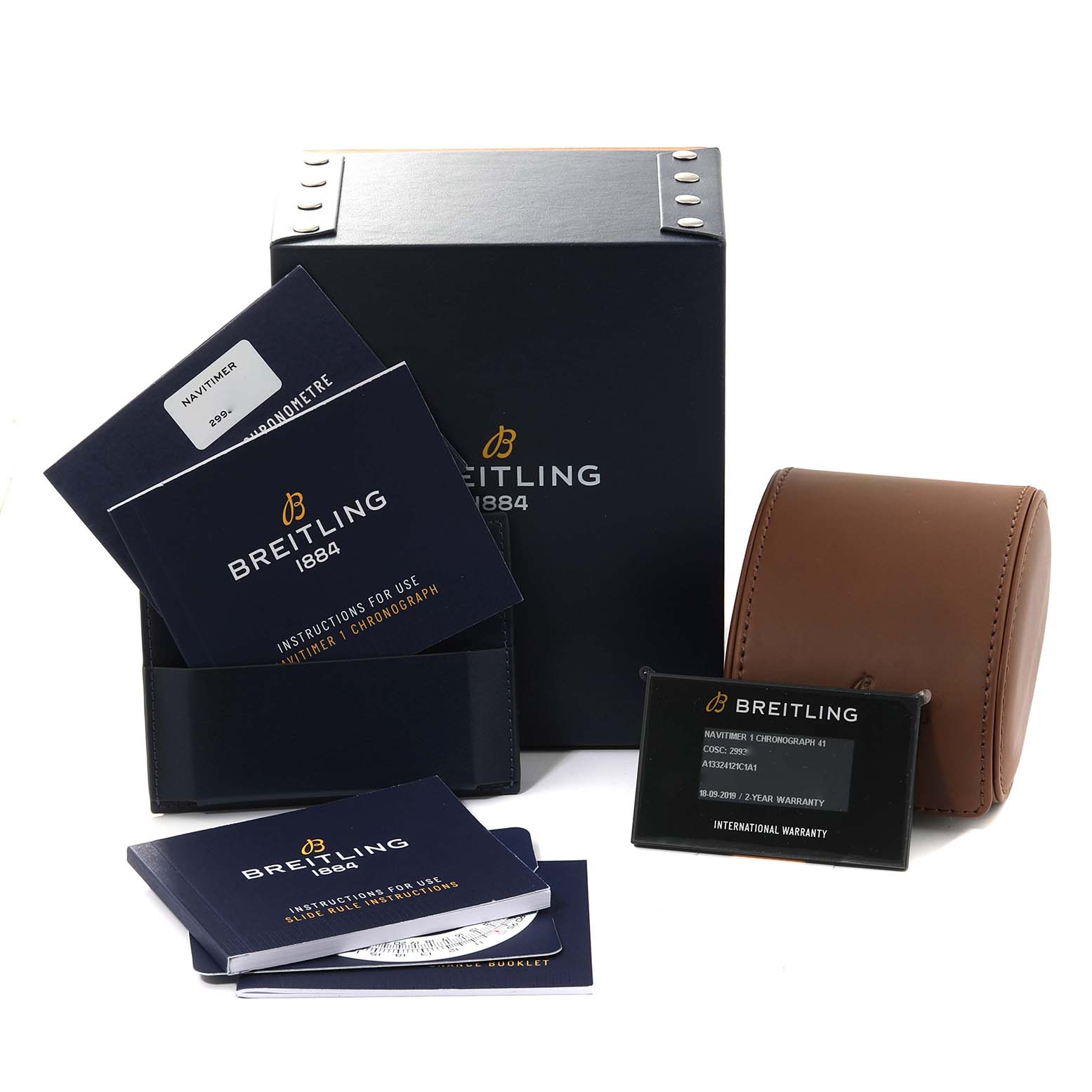 The image shows the packaging, manuals, warranty card, and travel case for a Breitling Navitimer A13324121C1A1 Men's Stainless Steel Blue Dial A13324121C1A1 Men's Stainless Steel Blue Dial watch.