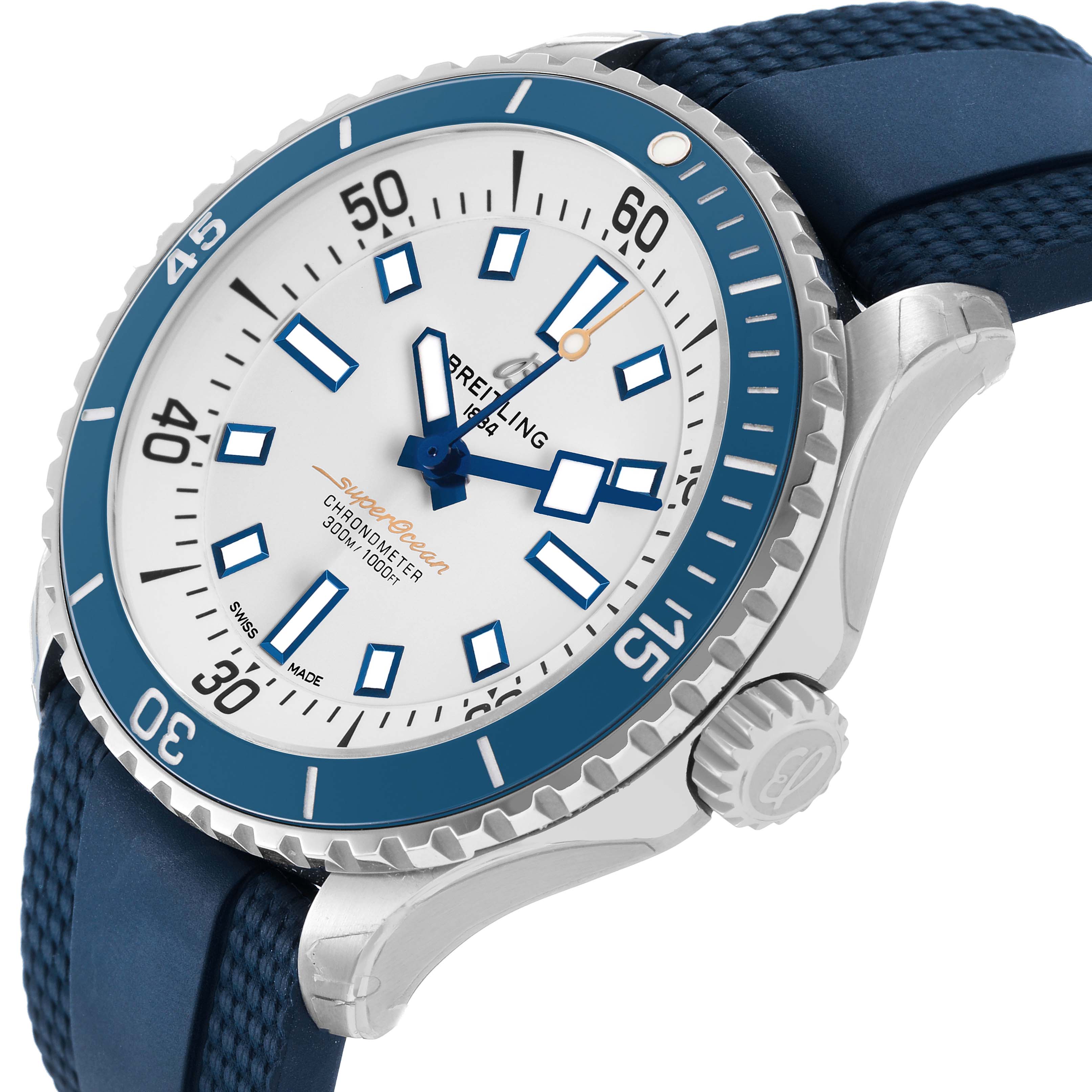 The Breitling Superocean A17375 Men's Stainless Steel Blue Dial watch is shown at an angled side view, highlighting its blue bezel, white dial, and blue strap.