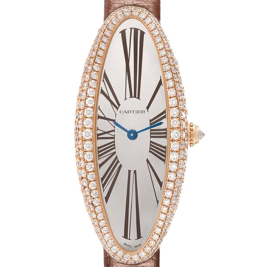 The Cartier Baignoire WJBA0006 Women's Rose Gold Silver Dial watch is shown from a front angle, displaying its oval dial, diamond bezel, and crown with a gemstone.