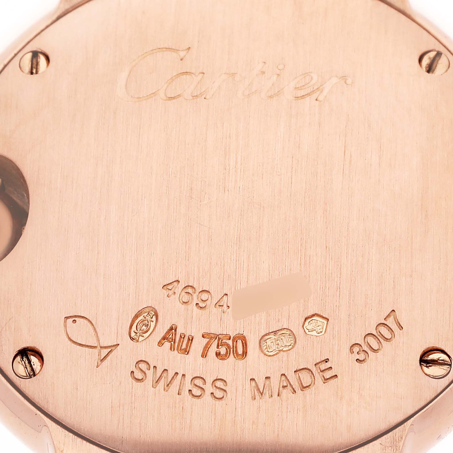 The image shows the inscription and markings on the case back of a Cartier Ballon Bleu W69002Z2 Women's Rose Gold Silver Dial W69002Z2 Women's Rose Gold Silver Dial watch.