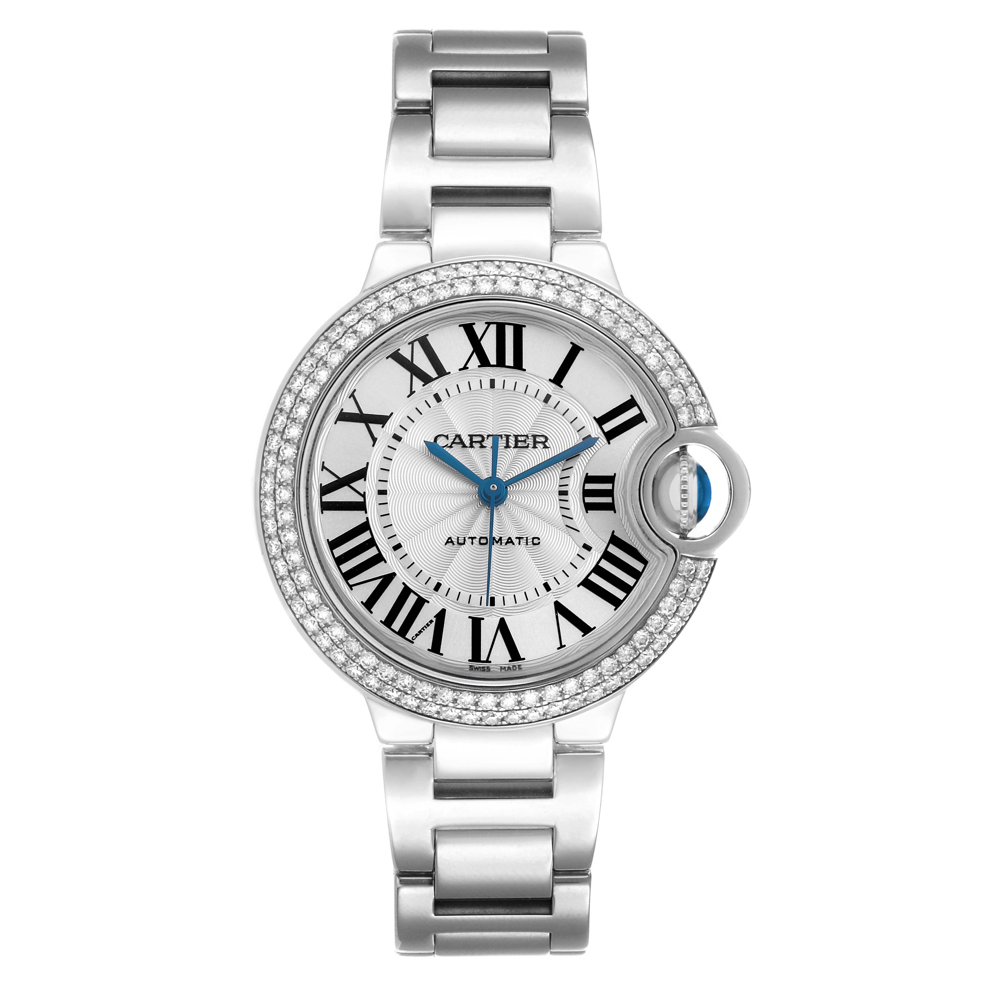 The Cartier Ballon Bleu WE902035 Women
s White Gold Silver Dial watch is shown from a top-down angle, displaying the face, bezel, and part of the bracelet.