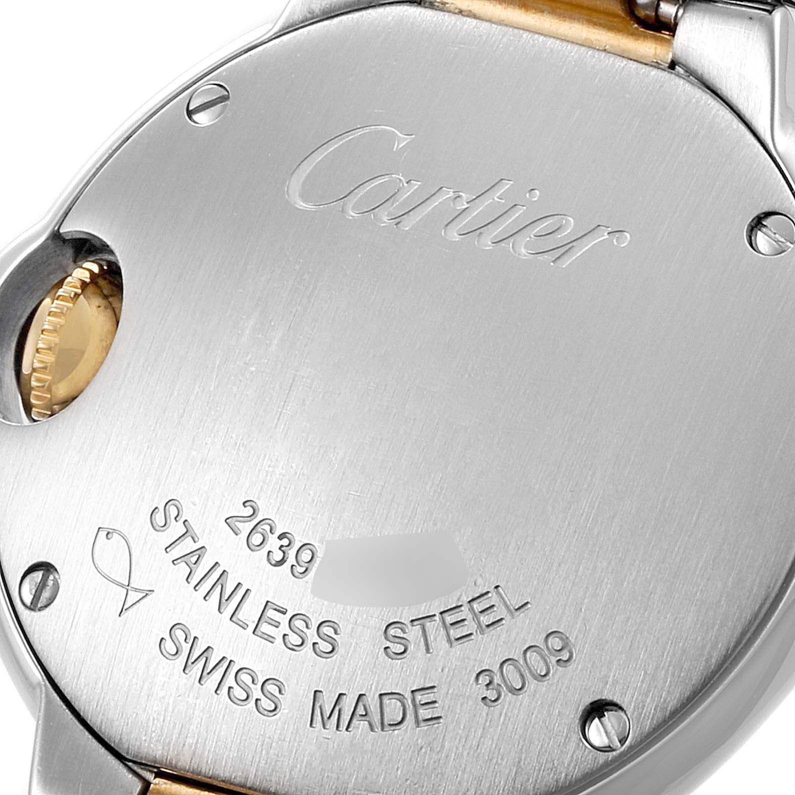 The image shows the back case of a Ballon Bleu de Cartier watch, displaying the brand name, model number, and material details.