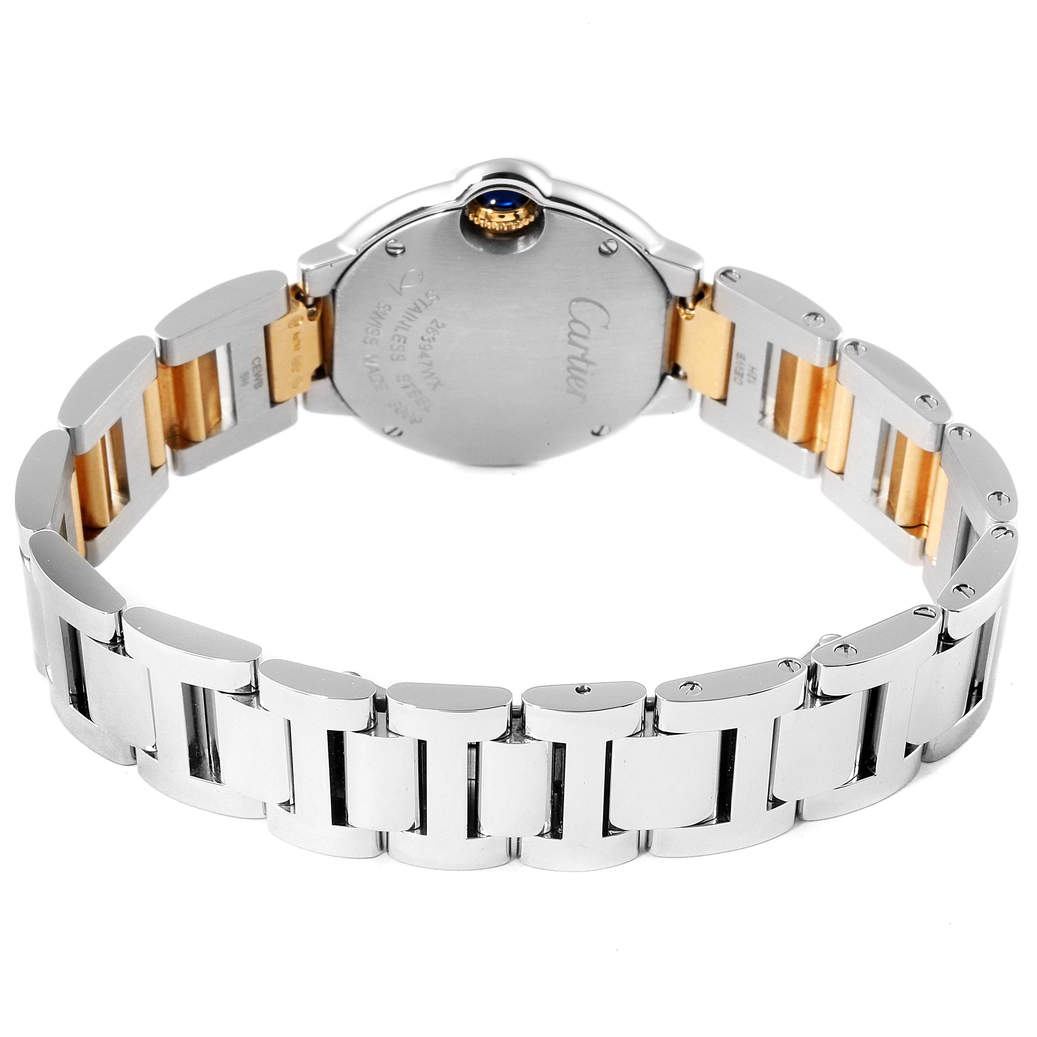 The image shows the rear side and bracelet of a Ballon Bleu model by Cartier, highlighting its stainless steel and gold detailing.
