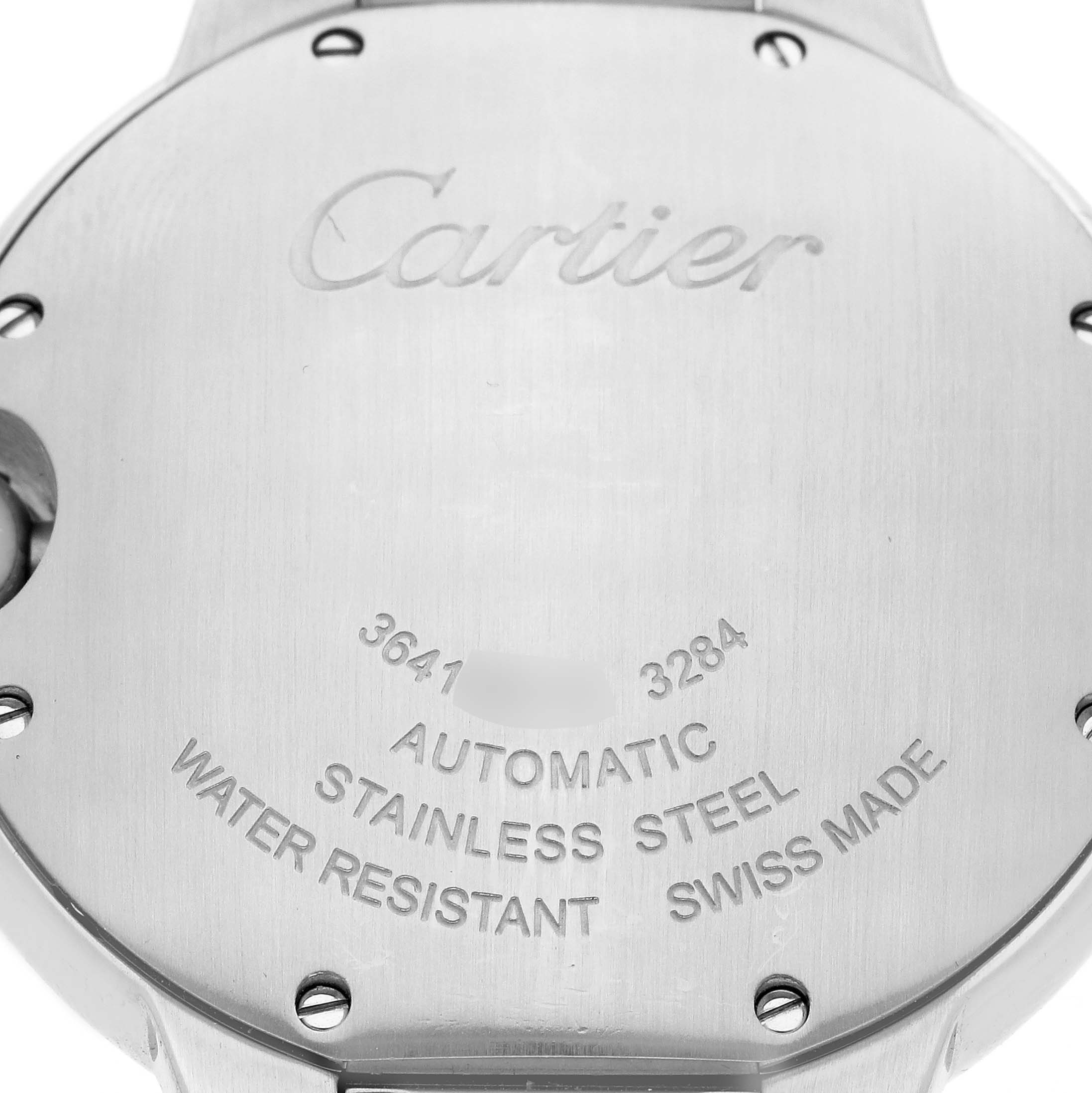 The image shows the back case of a Cartier Ballon Bleu W6920041 Women's Stainless Steel Pink Dial watch, displaying its engravings and screws.