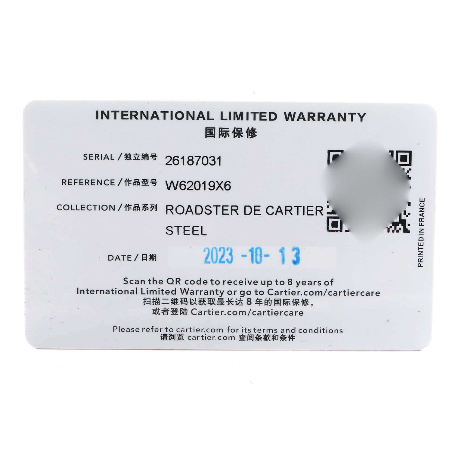 The image shows an International Limited Warranty card for the Cartier Roadster W62019X6 Men
s Stainless Steel Silver Dial model.