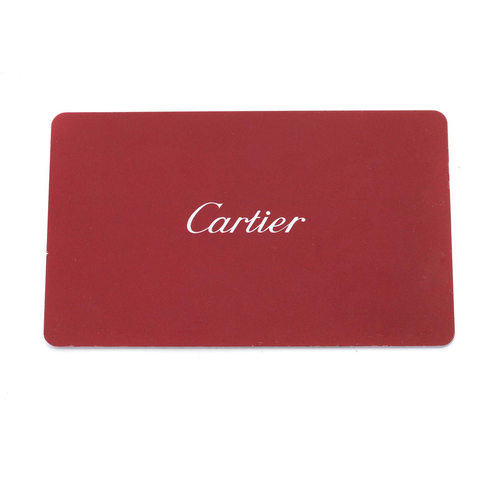 The image shows a red Cartier card, possibly an accessory related to the Cartier Roadster W62019X6 Men
s Stainless Steel Silver Dial model.
