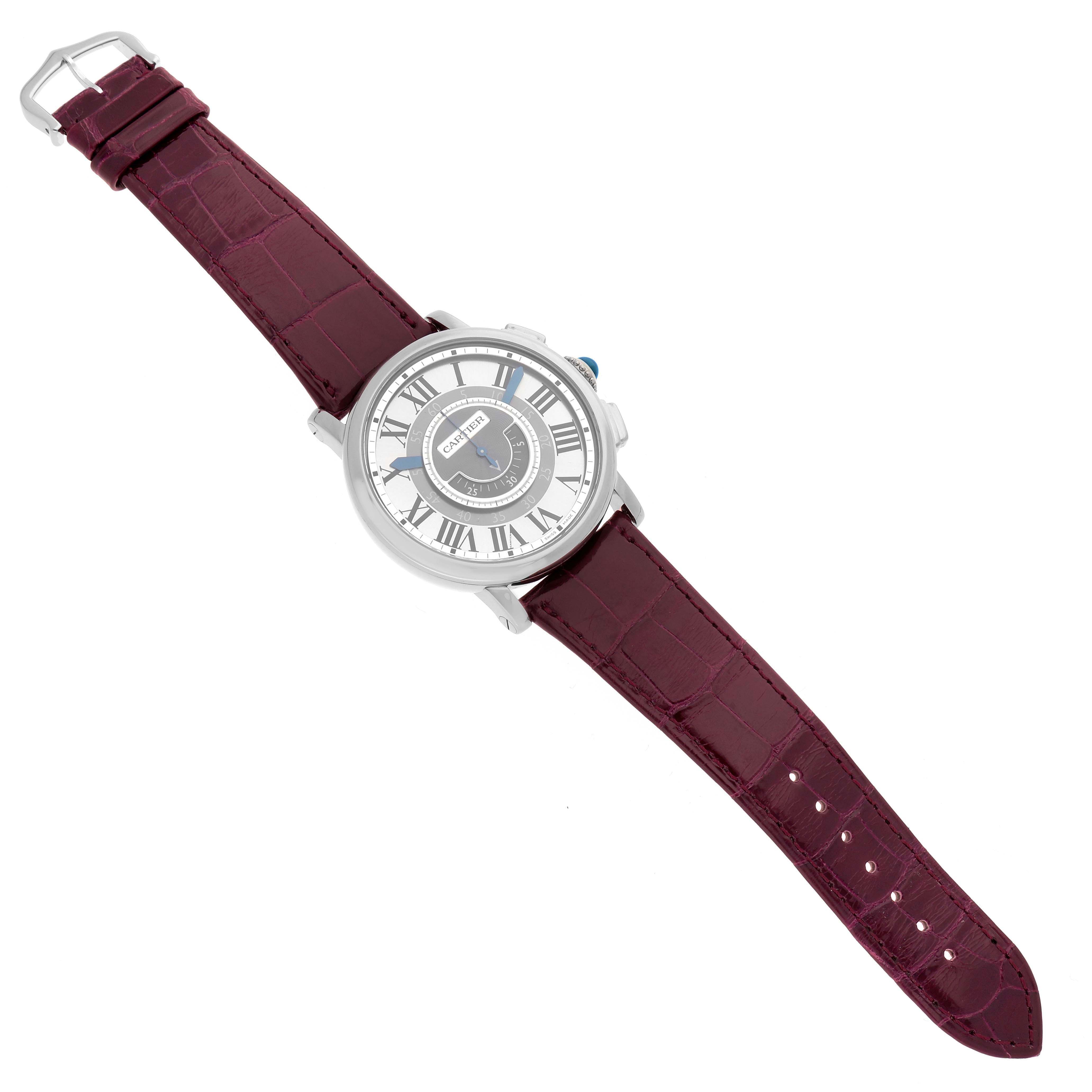 The image shows a Rotonde de Cartier watch from an angled top view, highlighting the face, case, and burgundy leather strap.