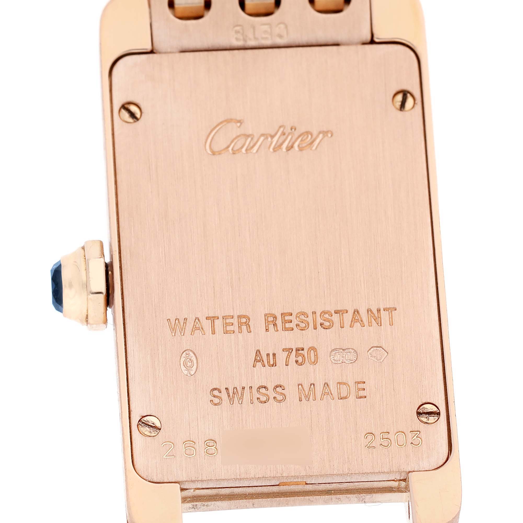 The image shows the back of the Cartier Tank Americaine W2620031 Women's Rose Gold Silver Dial watch, highlighting the brand logo, water resistance, and material details.
