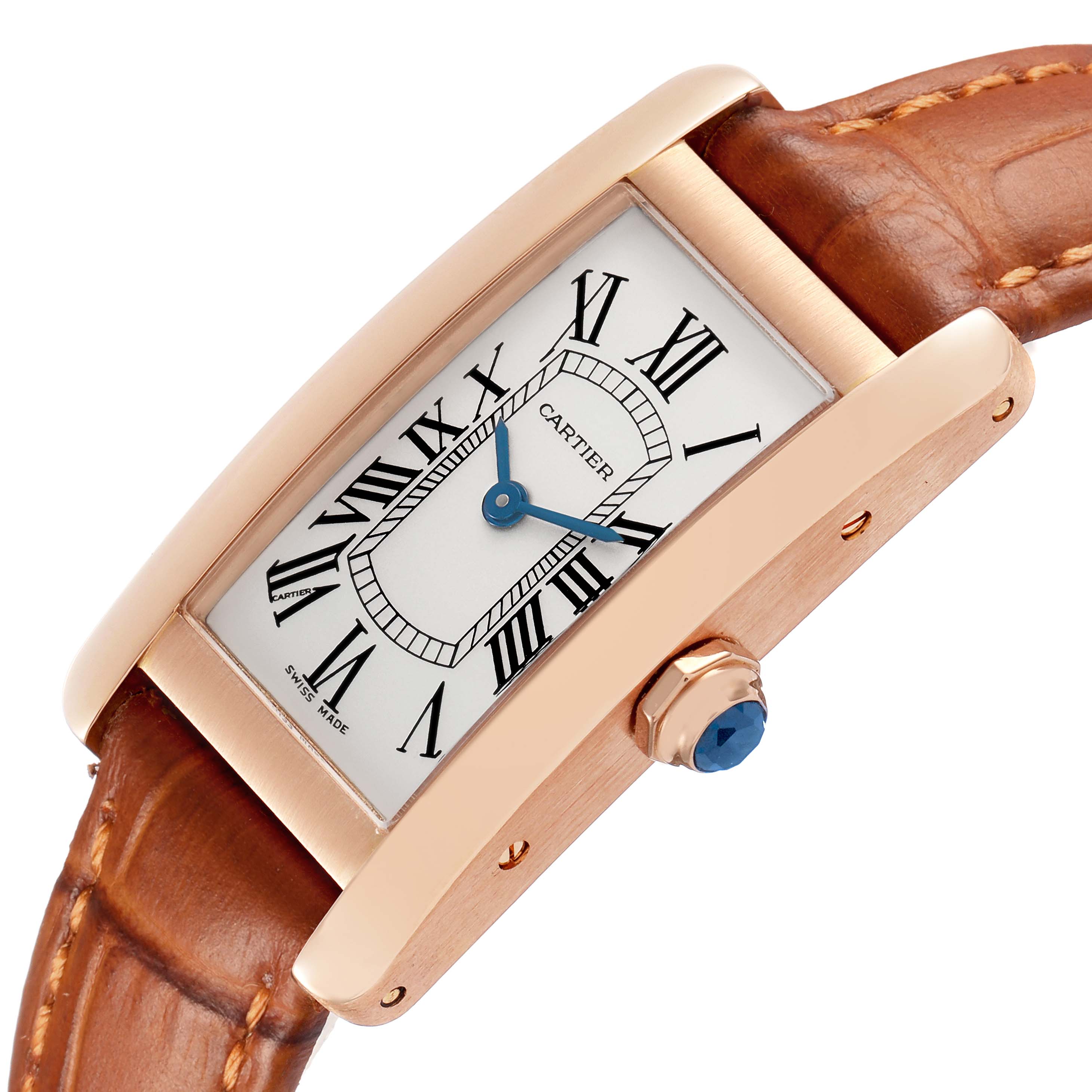 The Cartier Tank Americaine W2607456 Women's Rose Gold Silver Dial watch is shown at an angle highlighting the rose gold case, brown leather strap, and blue hands.