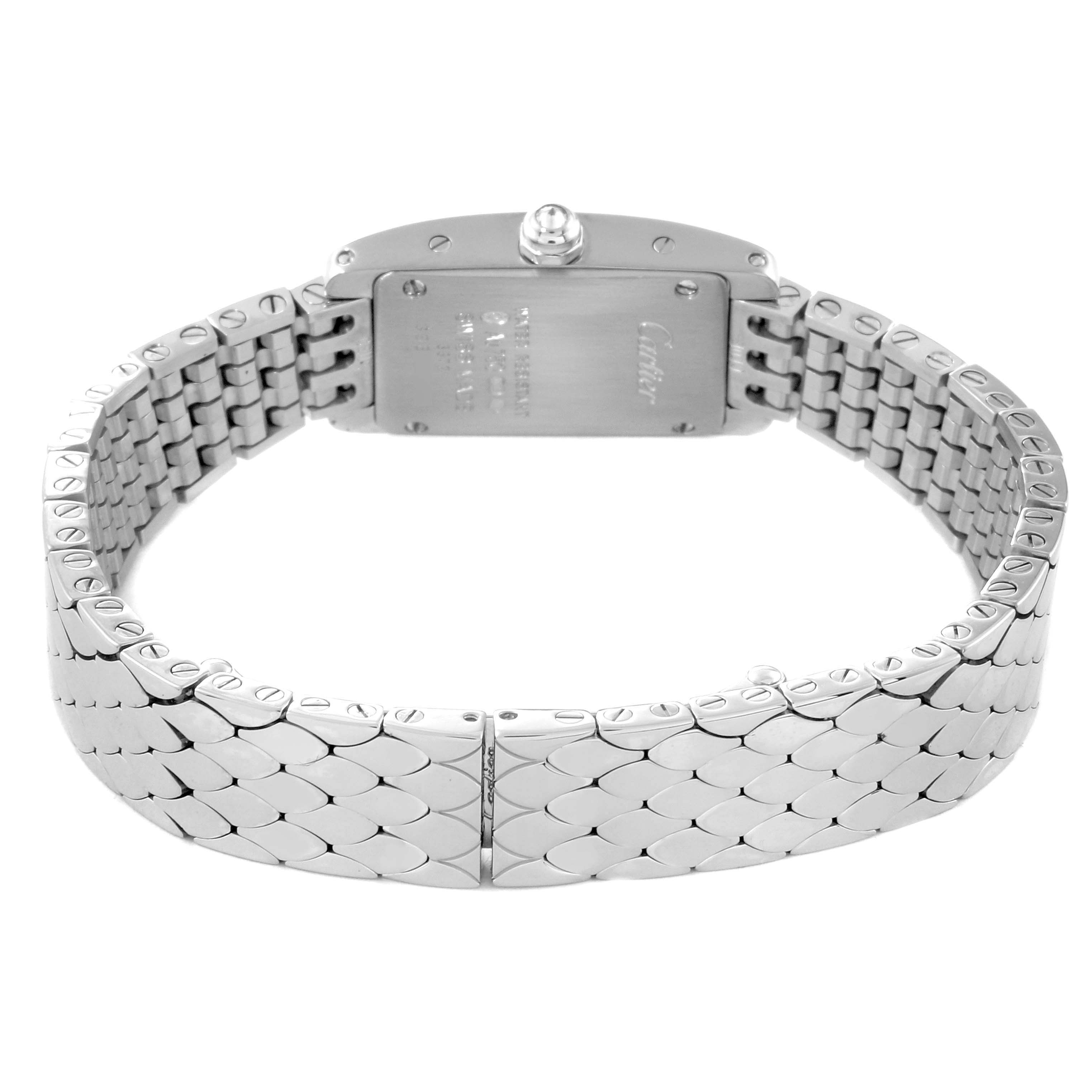 This image shows the back view of a Cartier Tank Americaine WB710013 Women's White Gold Silver Dial WB710013 Women's White Gold Silver Dial watch, highlighting its stainless steel bracelet and case.